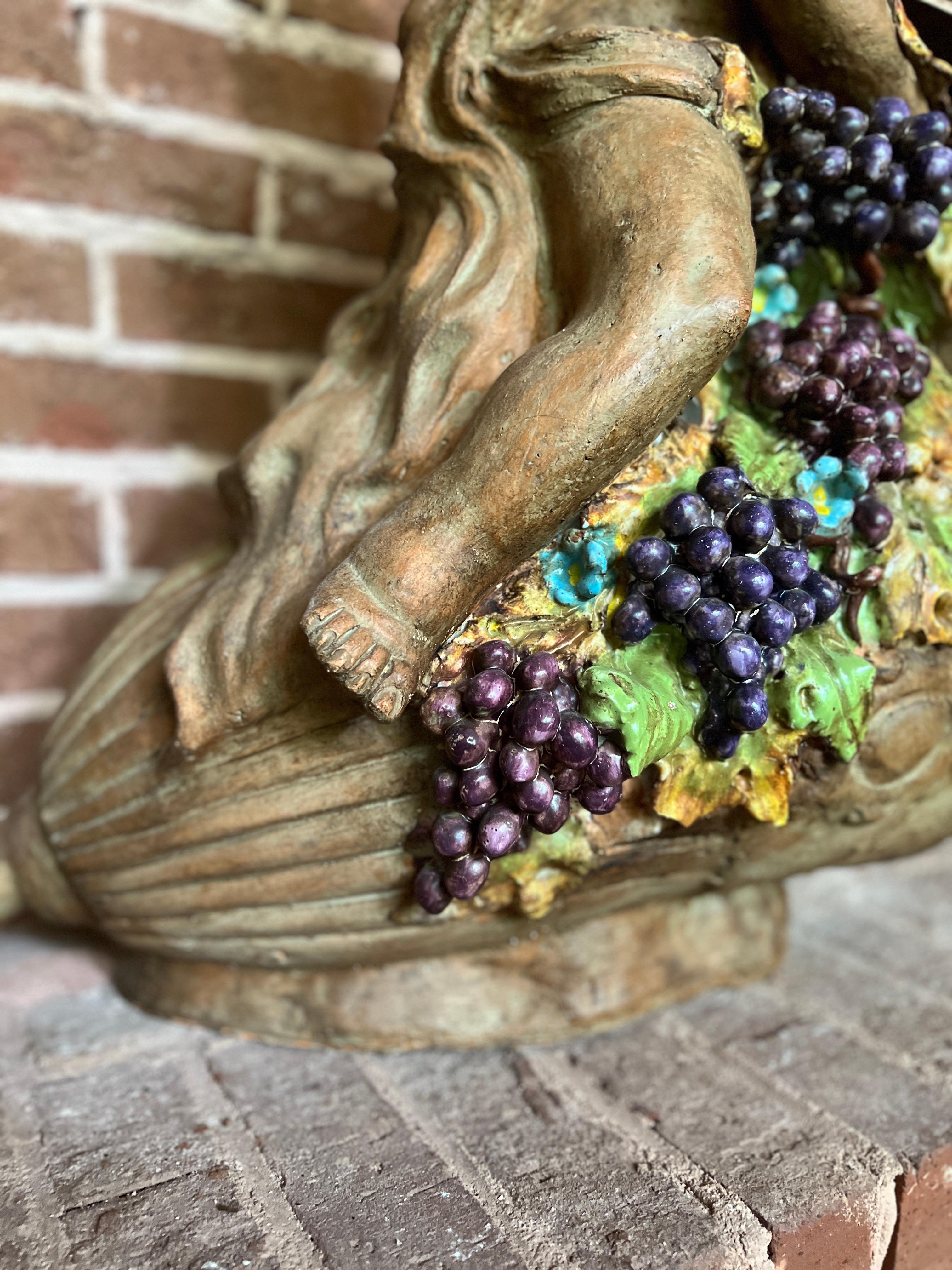 Large Italian Terracotta Putti & Grape Vine Adorning a Wine Vessel Sculpture In Good Condition For Sale In Atlanta, GA