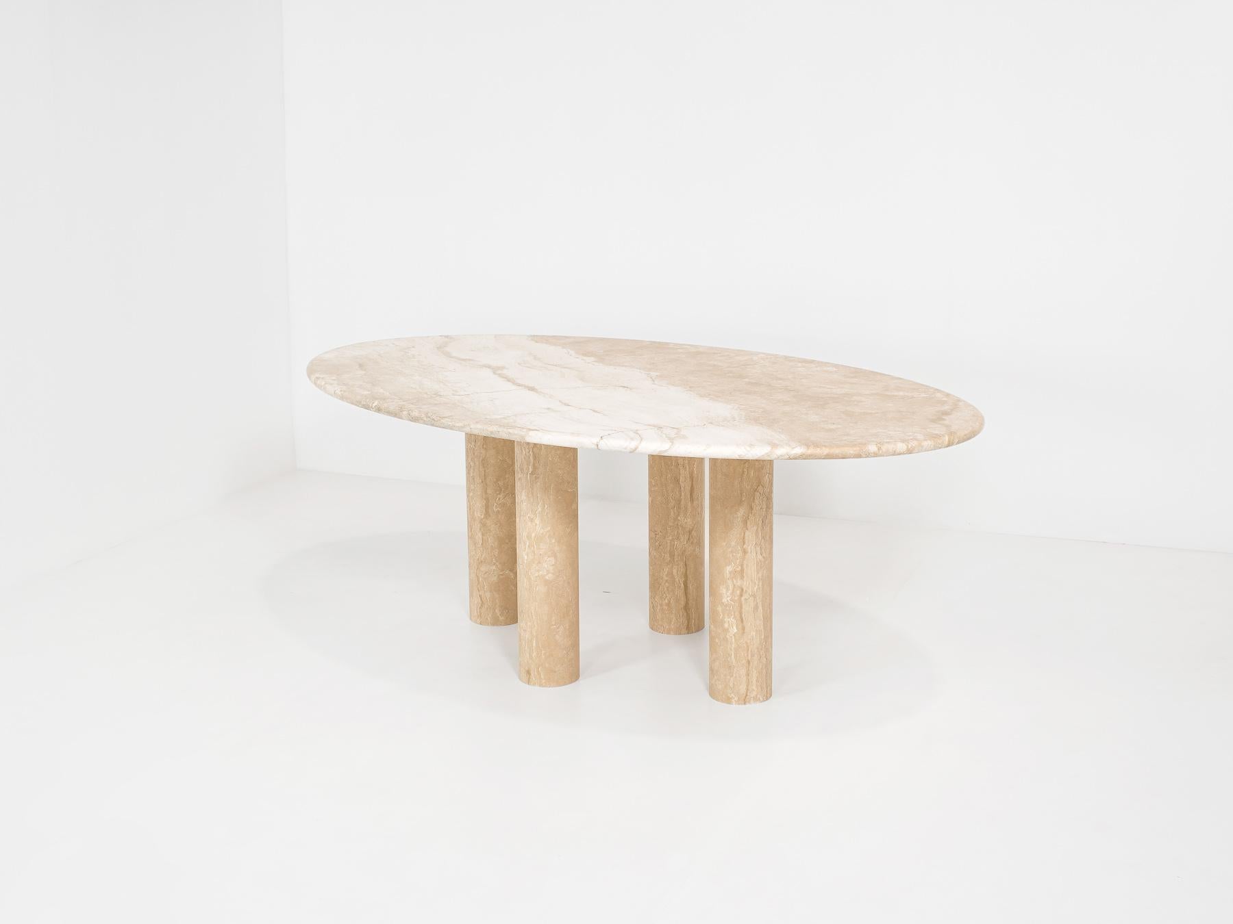 Large oval dining table, reminiscent of Mario Bellini’s “Il Colonnato”
The tabletop has a beautiful drawing. It has a polished look. 
The column legs can be arranged according to your preference (wide or centered).

It seats 6-8 people.

The