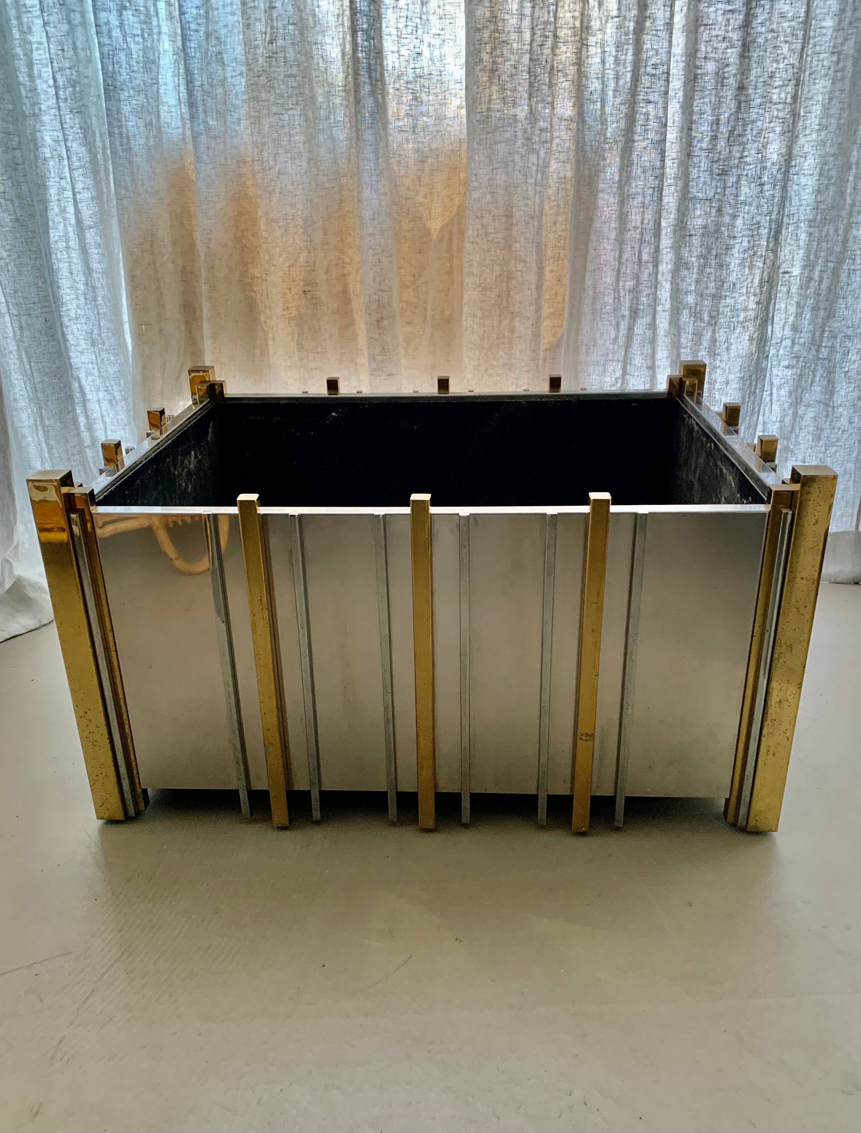 Large elegant vintage Italian Midcentury Modern chrome/golden metal planter from 1970s. The planter has an inside proctective zinc container for planting, it is in good shape and does have patina according to age and use. 