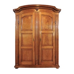 Large Italian Walnut Armoire, circa 1800 with Paneled Doors and Scrolled Motifs