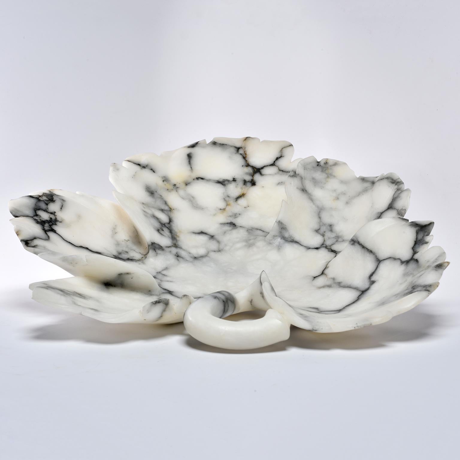 Custom made for us in Italy, this white alabaster platter or shallow bowl has gray veining and is in the form of a leaf.