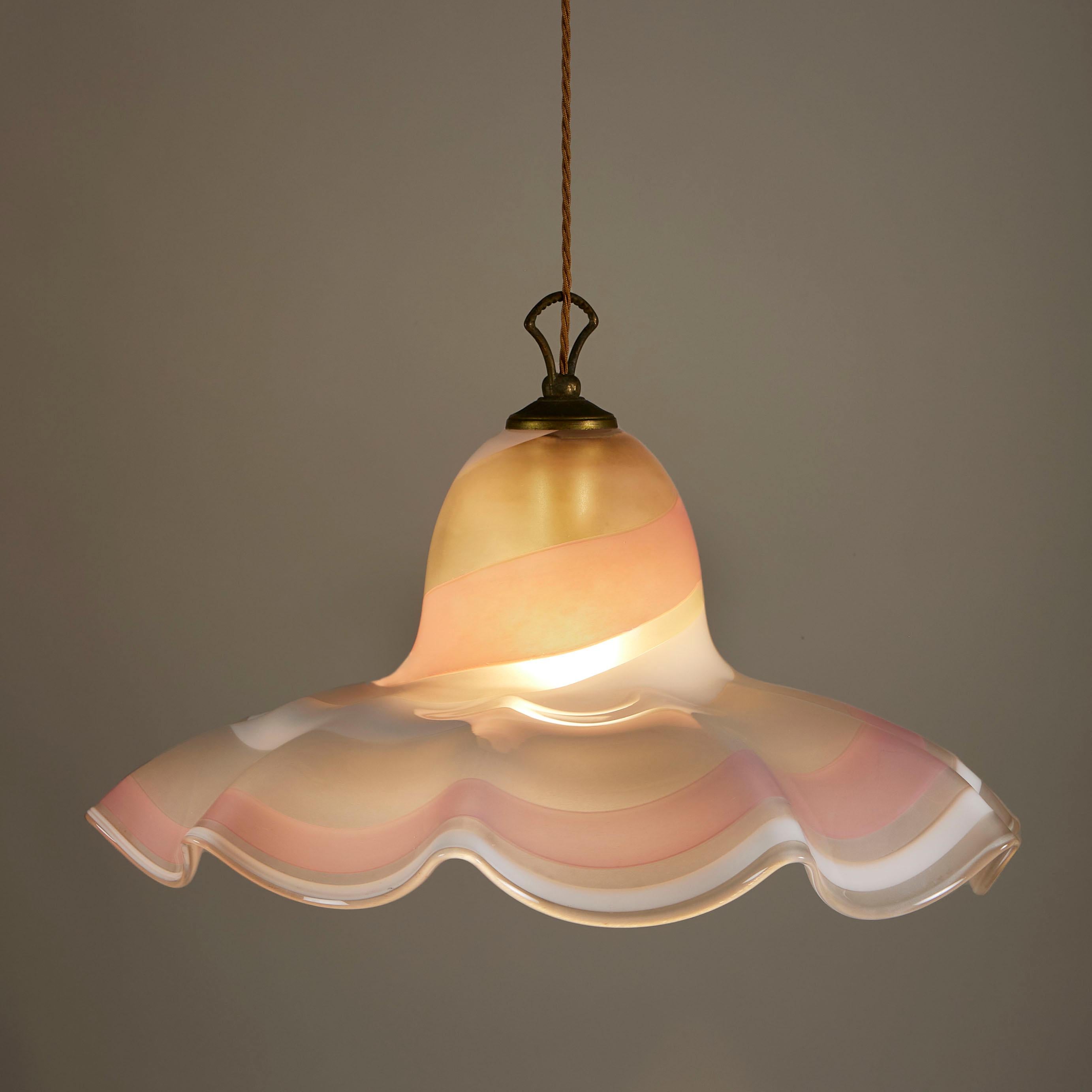 Elegant large Murano chandelier that feels soft and delicate both in the colour combination of pink, white and cream swirls and the traditional Italian handkerchief shape. Finished with brass hardware.
