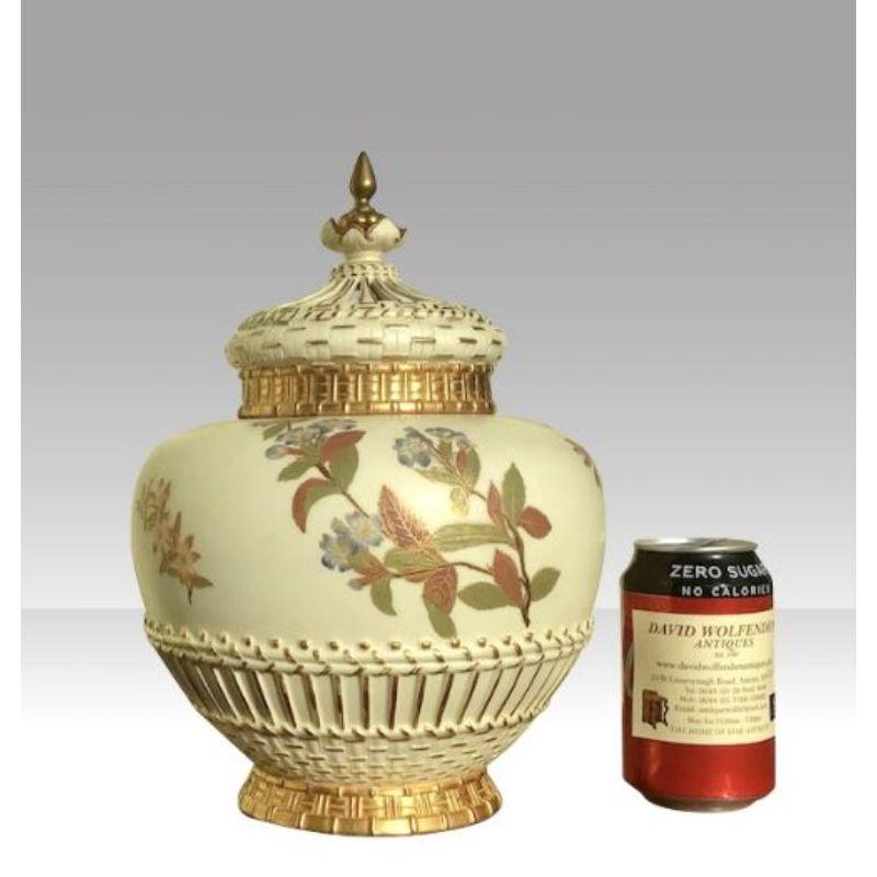 Wonderful large antique Royal Worcester ivory pot Pourri jar vase and crown cover complete with inner cover, hand painted with flowers and foliage etc.

Vase and cover Puce mark dated 1889
31cms high
20cms diameter
(12ins high) 
Perfect