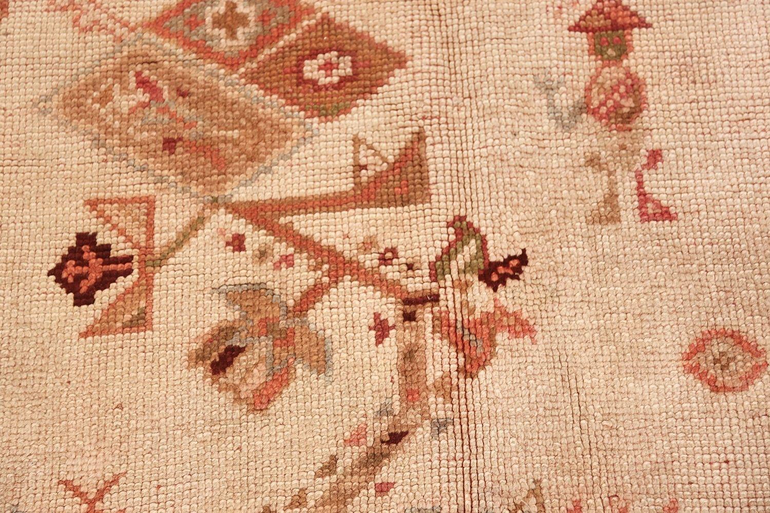 Ivory Background Antique Irish Donegal Rug. 15 ft x 17 ft In Good Condition For Sale In New York, NY
