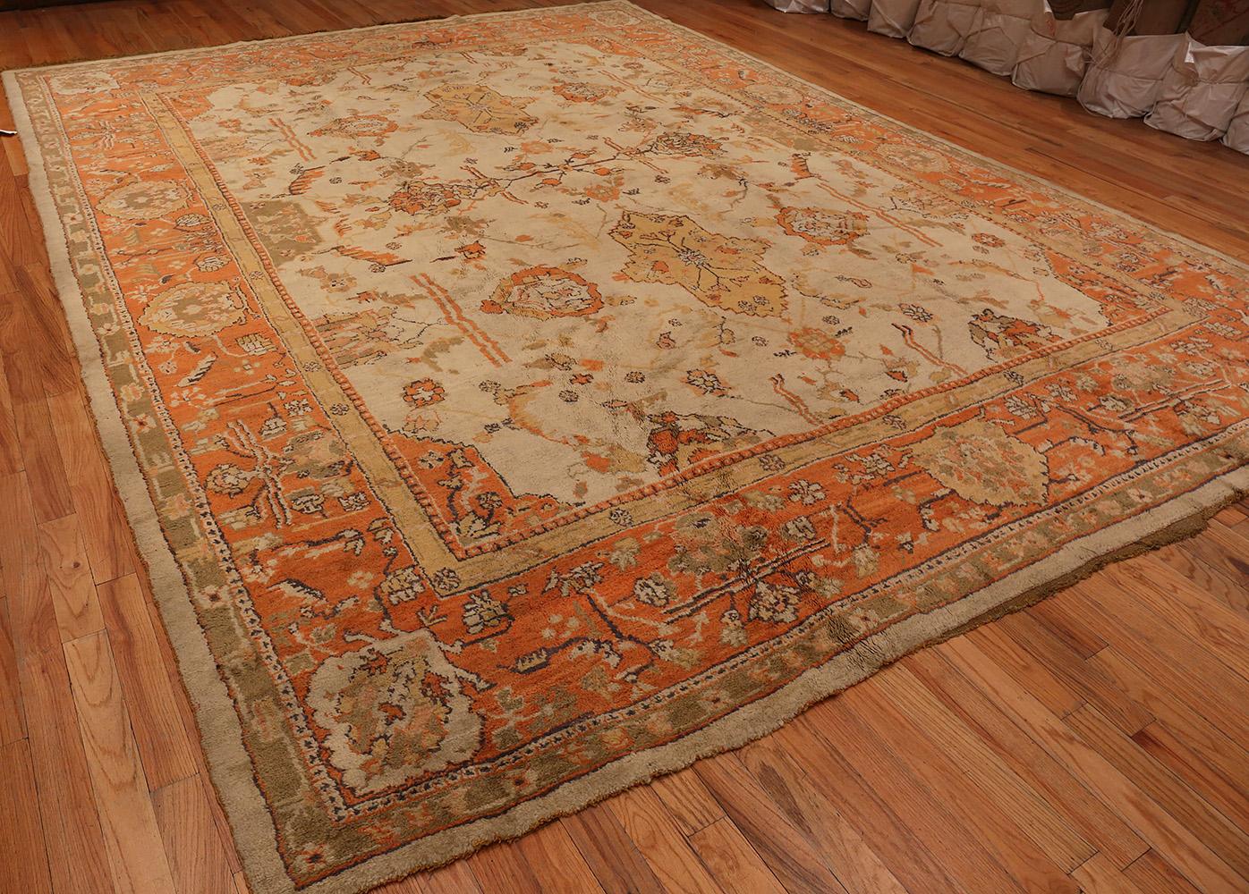 Decorative Antique Ivory Background Turkish Oushak Oriental Rug, Country of Origin / Rug Type: Turkish Rugs, Circa Date: 1900. Size: 12 ft x 15 ft (3.66 m x 4.57 m).