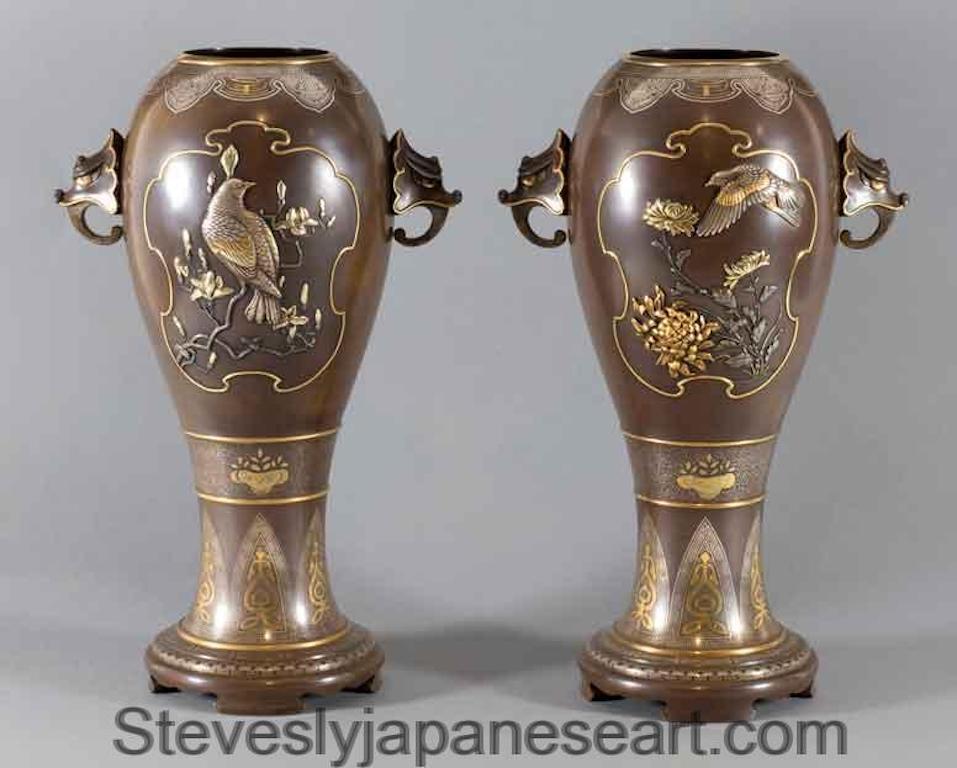 As part of our Japanese works of art collection we are delighted to offer this most stylish high quality pair of Meiji Period (1868-1912), bronze and mixed metal vases artist signed by Masayuki. The main body of the vases comprise of a pair of