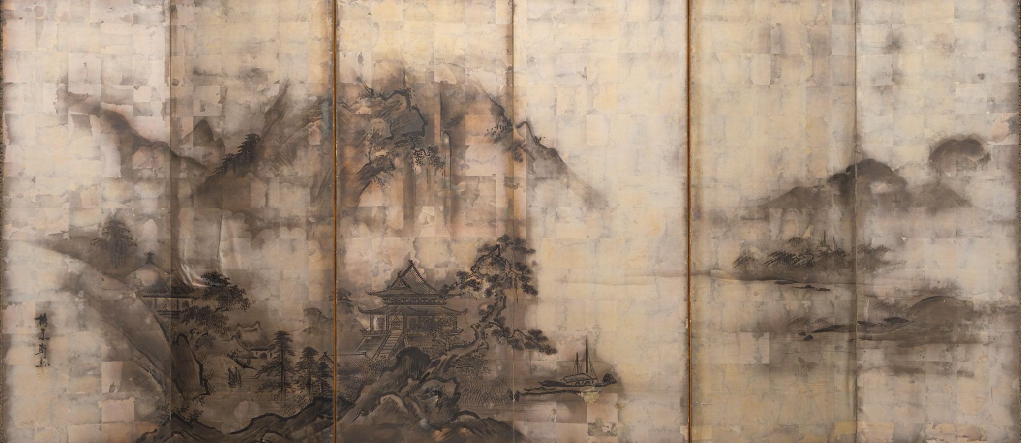 A captivating large six-panel byôbu (folding screen) with a refined Nanga School-style painting of a peaceful mountain landscape along a river. A large Chinese pavilion sits at the base of a tall towering cliff, next to a large curving pine tree