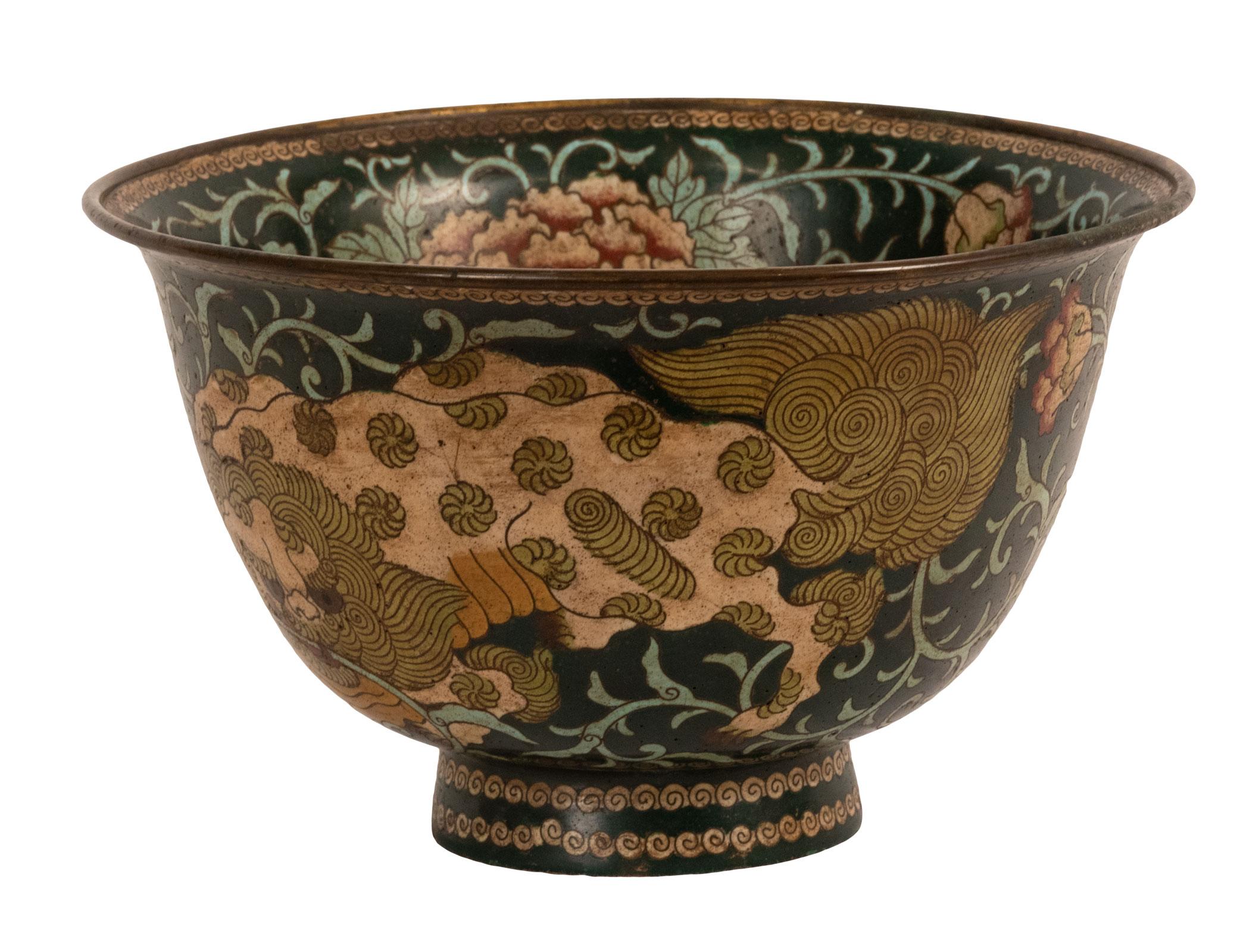 Large Japanese cloisonné (shippo, ???) Meiji bowl, circa 1870
A deep bowl with the interior featuring a Komainu ((??), lion-dog, holding a lotus flower in its mouth. The interior, exterior, and foot are decorated with lotus blooms, petals, vinery,