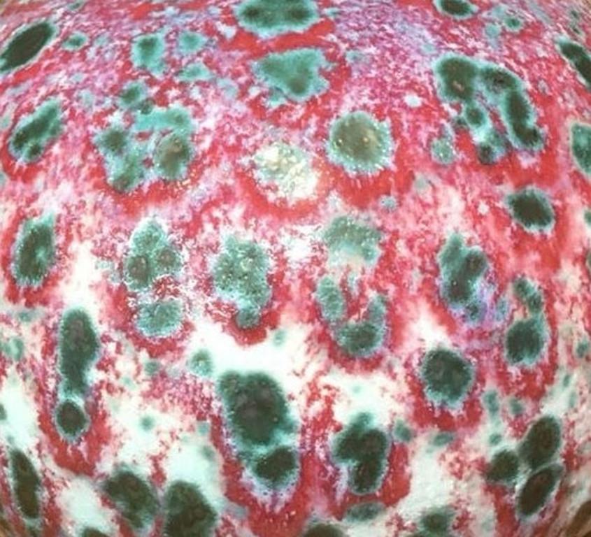 Exquisite large Japanese contemporary hand-glazed decorative porcelain vase in a beautiful globular form in striking signature red and green creating a mesmerizing pattern named 