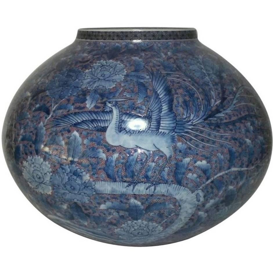 Unique striking large contemporary decorative porcelain vase, intricately hand-painted in underglaze blue on a beautifully shaped ovoid porcelain body, a masterpiece by widely acclaimed award-winning second generation Japanese master porcelain