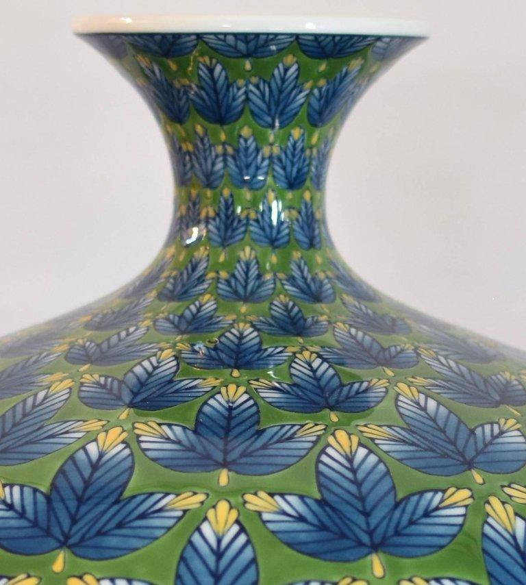 Contemporary large Japanese decorative porcelain vase, hand-painted in vivid blue and green on an elegantly shaped porcelain body, a signed creation of master artist highly acclaimed and award-winning master porcelain artist whose kiln is located in