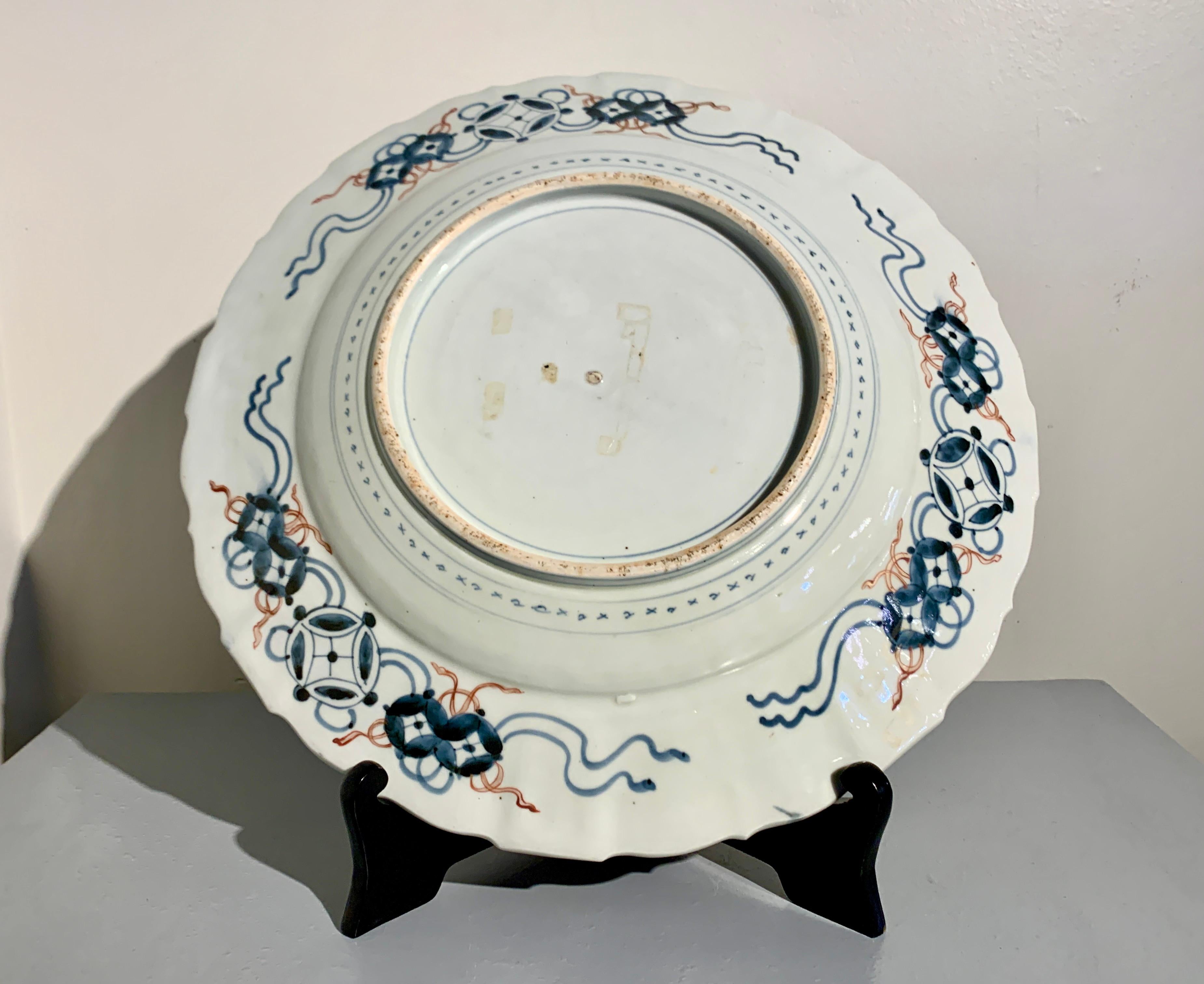 Large Japanese Imari Porcelain Charger with Koi, Meiji Period, late 19th century In Fair Condition For Sale In Austin, TX