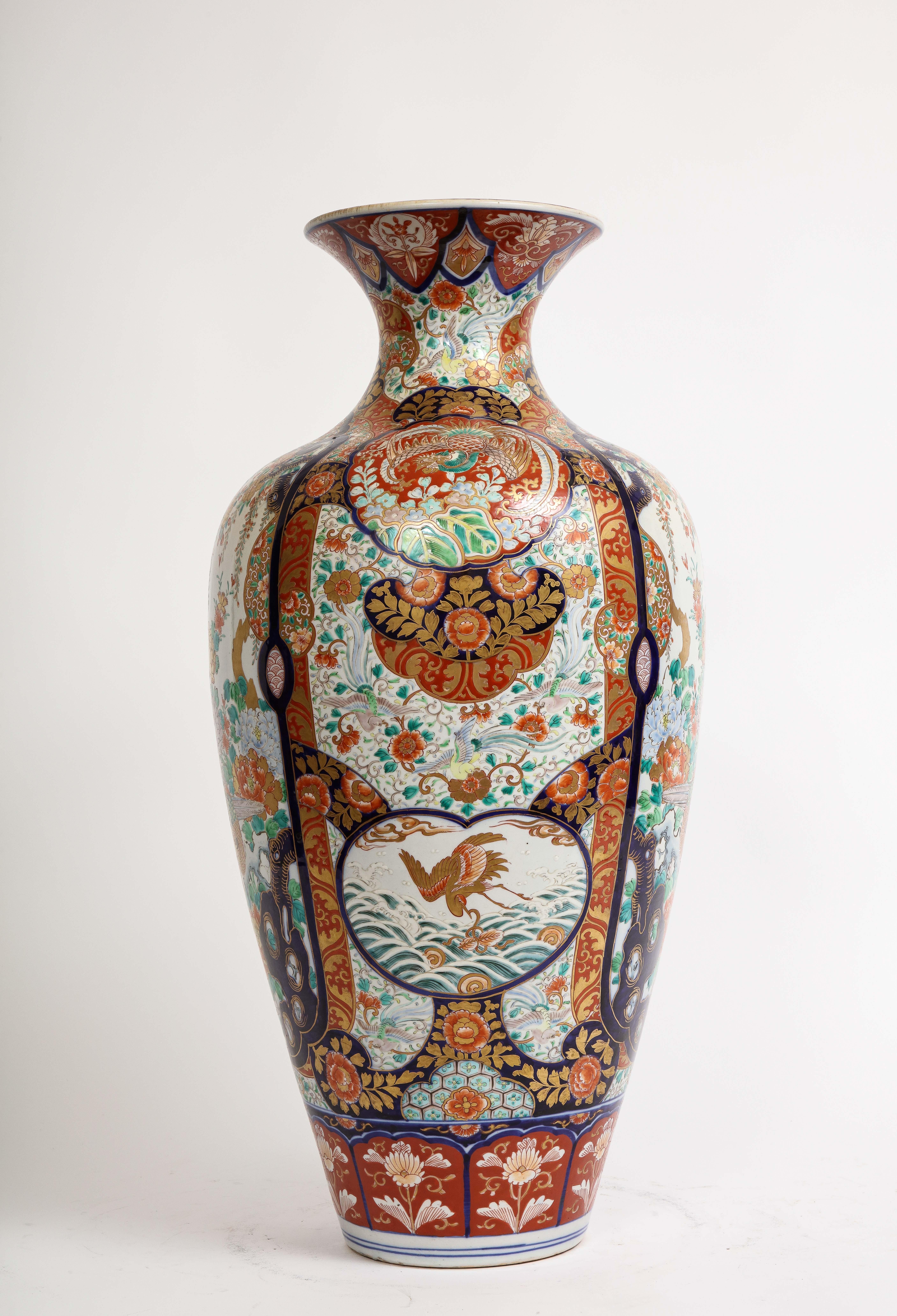Large Japanese Imari Porcelain Vase, Meiji Period, Circa 1880

An exceptional Japanese Imari porcelain vase stands tall at an impressive 29 inches in height, dating back to the 1880s.

The front panel of this masterpiece showcases a captivating