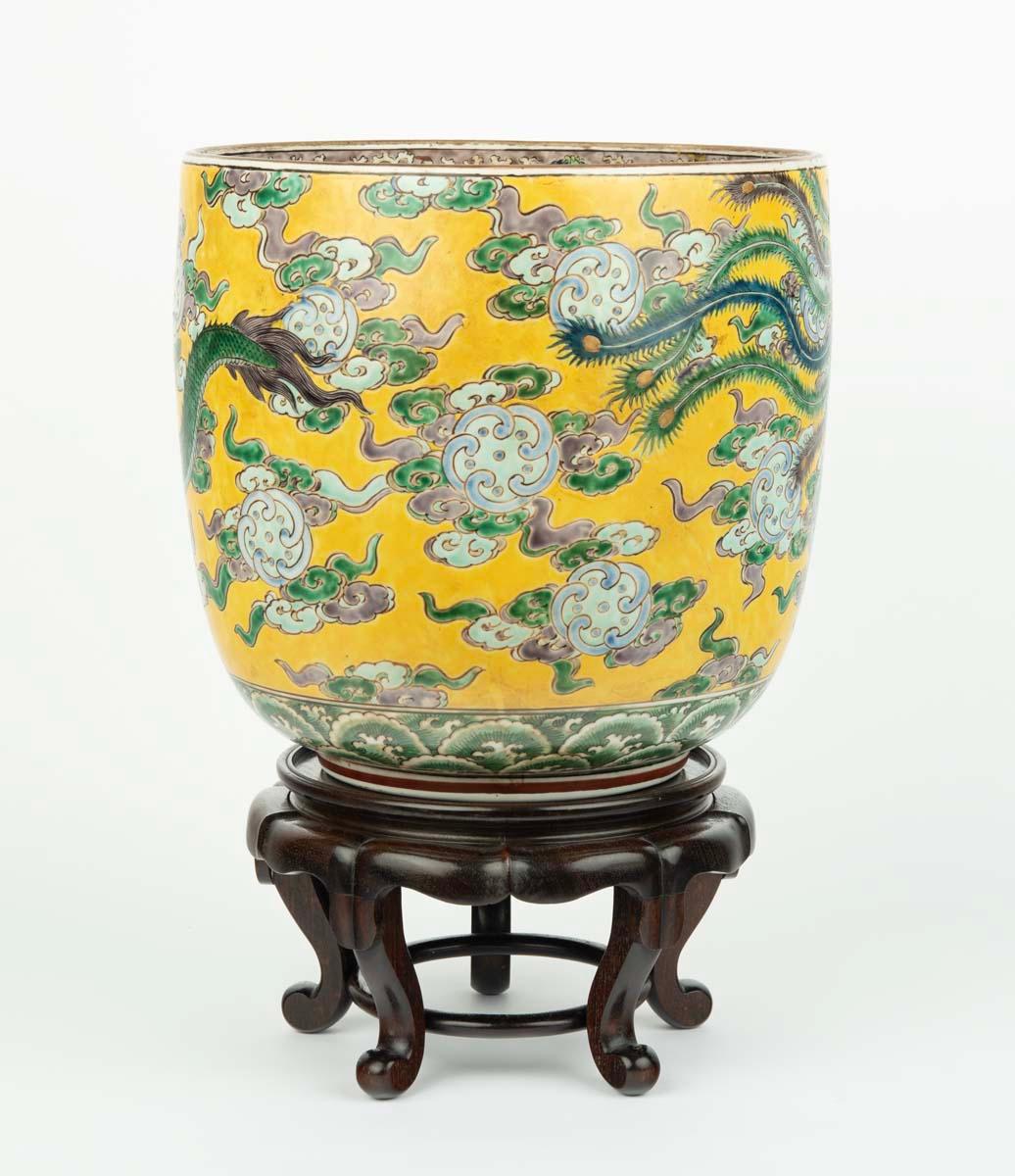 As part of our Japanese works of art collection we are delighted to offer this large Meiji Period (1868-1912), Kutani Jardiniere vibrantly decorated in famile verte coloured enamels, this large, useful and highly decorative plant pot is