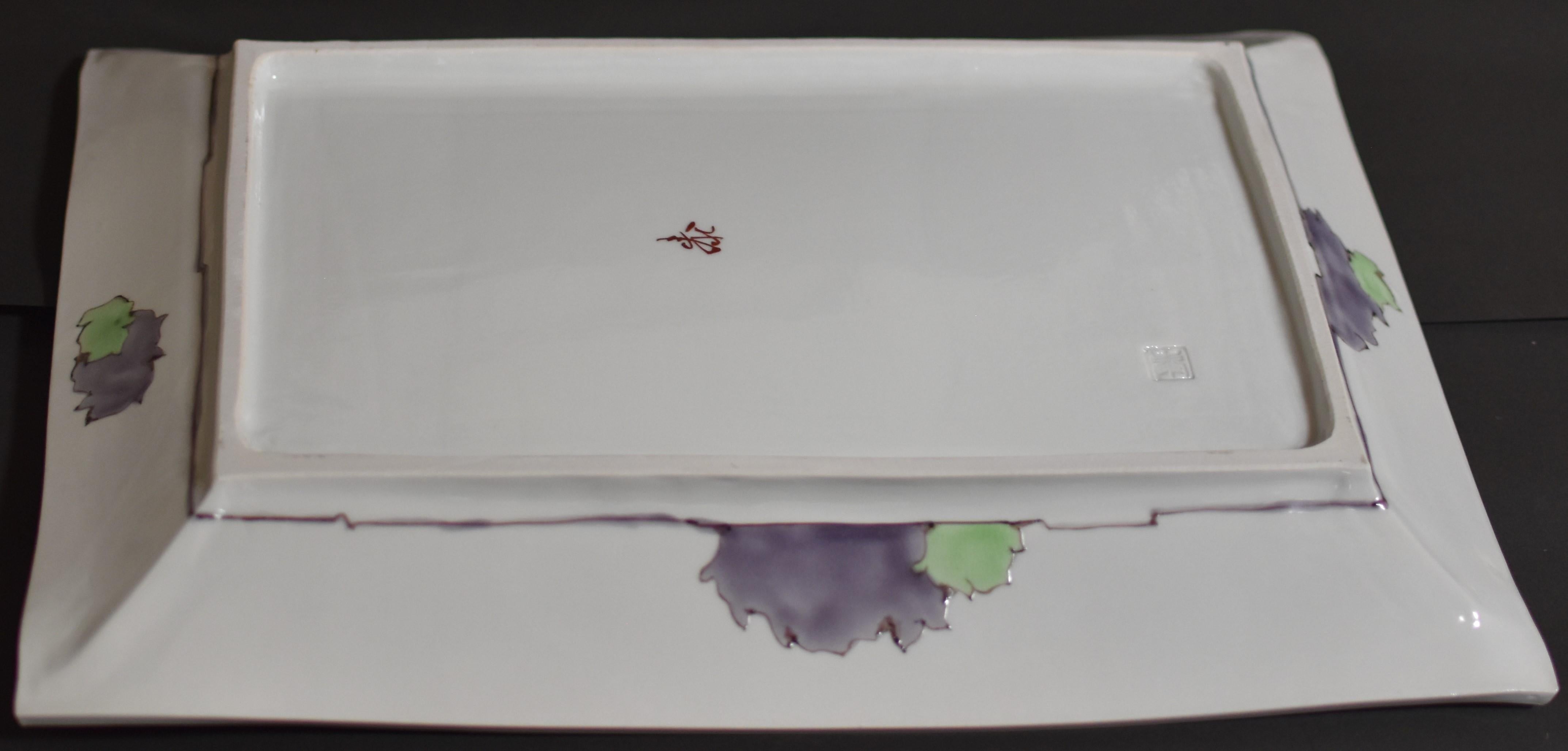 Extraordinary Japanese contemporary museum-quality decorative porcelain charger, stunningly hand painted in royal purple and yellow on a beautiful rectangular shape body, with a unique interpretation of giraffes, the artist's signture pattrn. This