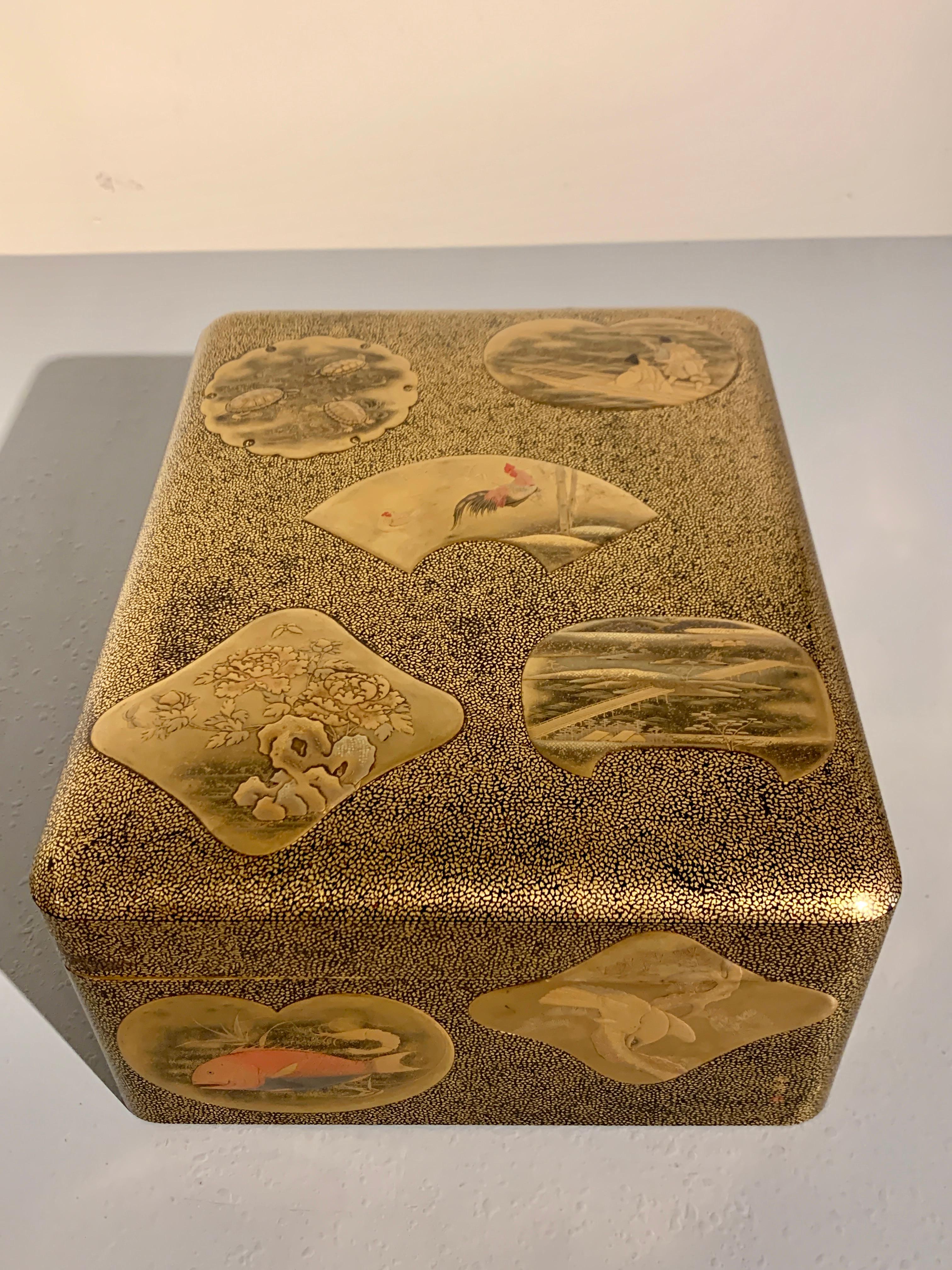 A large and magnificently decorated Japanese lacquer document box, ryoshibako, signed Umeboshi/Baikyo, late Edo or early Meiji Period, mid 19th century, Japan.

The large document box, ryoshibako, of tall, rectangular shape with rounded corners, and