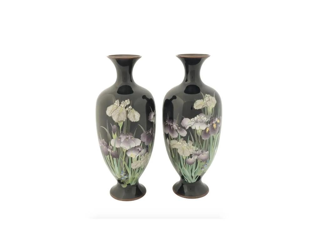 A pair of large antique Japanese copper vases with cloisonne enamel design. Late Meiji period,The vases have a rounded body, pronounced necks and bases. The front side depicts iris flowers against the black background. Oriental Decor For Interior