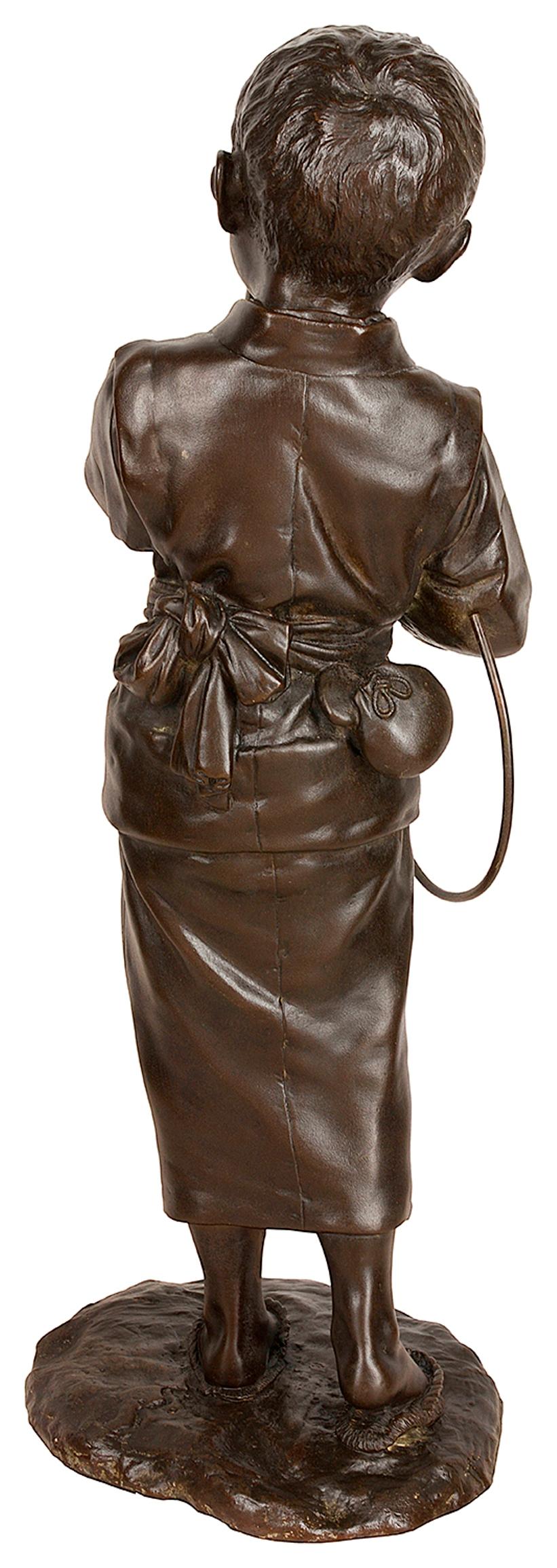 Large Japanese Meiji Period Bronze of a Young Child with a Play Hoop In Good Condition For Sale In Brighton, Sussex