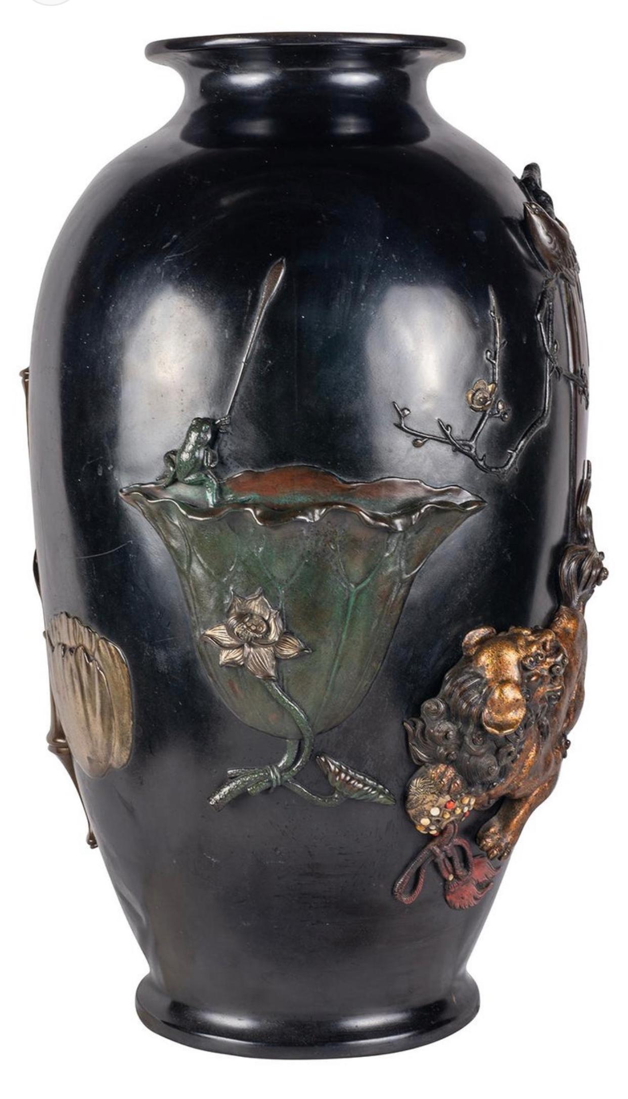 A wonderful Japanese Meiji period (1868-1912) Bronze overlay vase. Having exquisite and amusing scenes in relief, patinated and overlay of a Dog of Foo, a Frog fishing in a Lotus leaf cup, a Bamboo and bronze vase and jardiniere. a larger bronze
