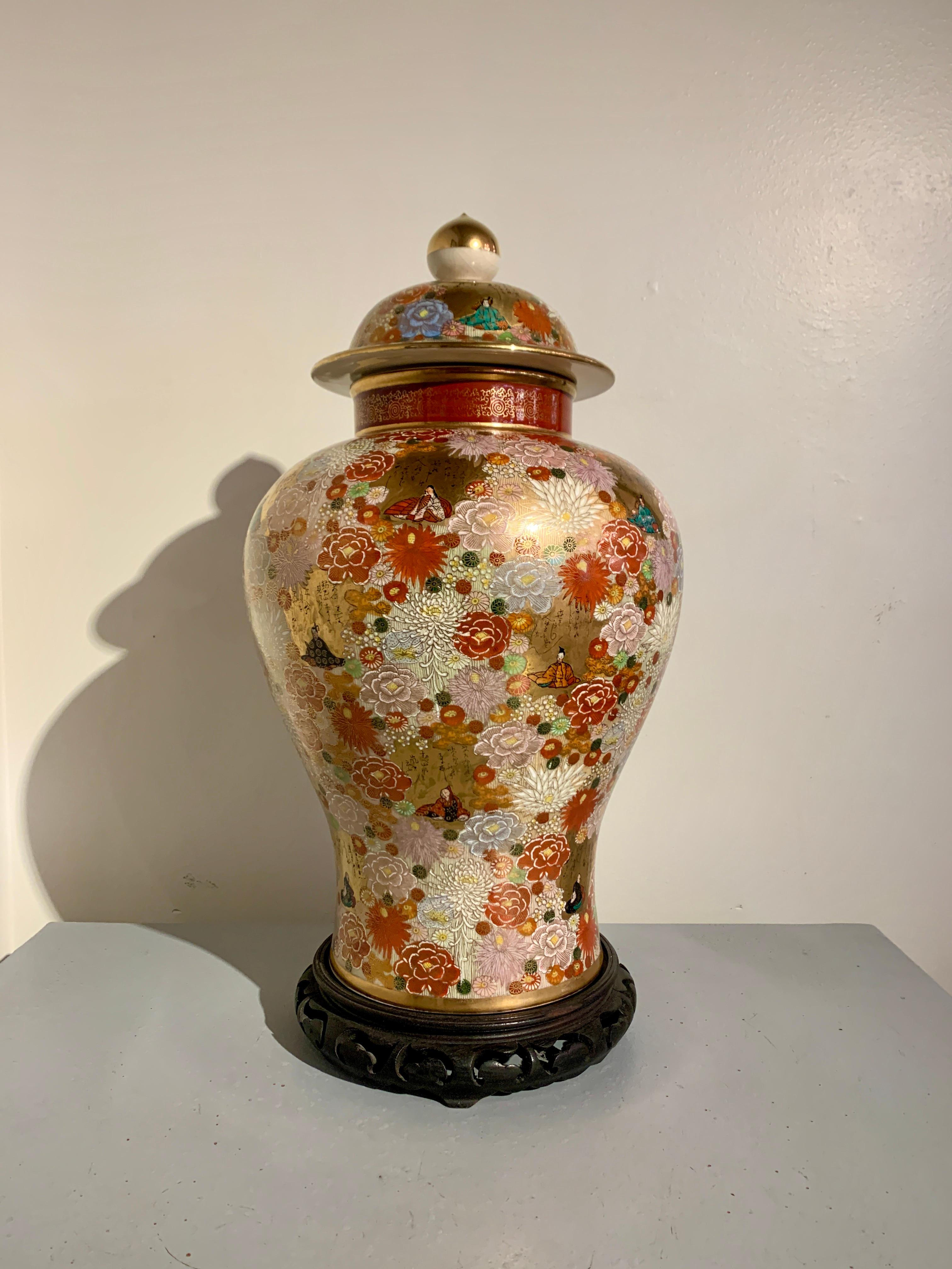 A very large and exuberantly decorated Japanese Satsuma millefleur covered vase, marked Satsuma, Showa period, mid 20th century, Japan.

The large vase of attractive baluster form, with a slightly splayed foot, narrow waist, and tapered body with