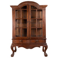 Large Javanese Cabinet with Paneled Glass Doors, Bonnet Top and Cabriole Legs