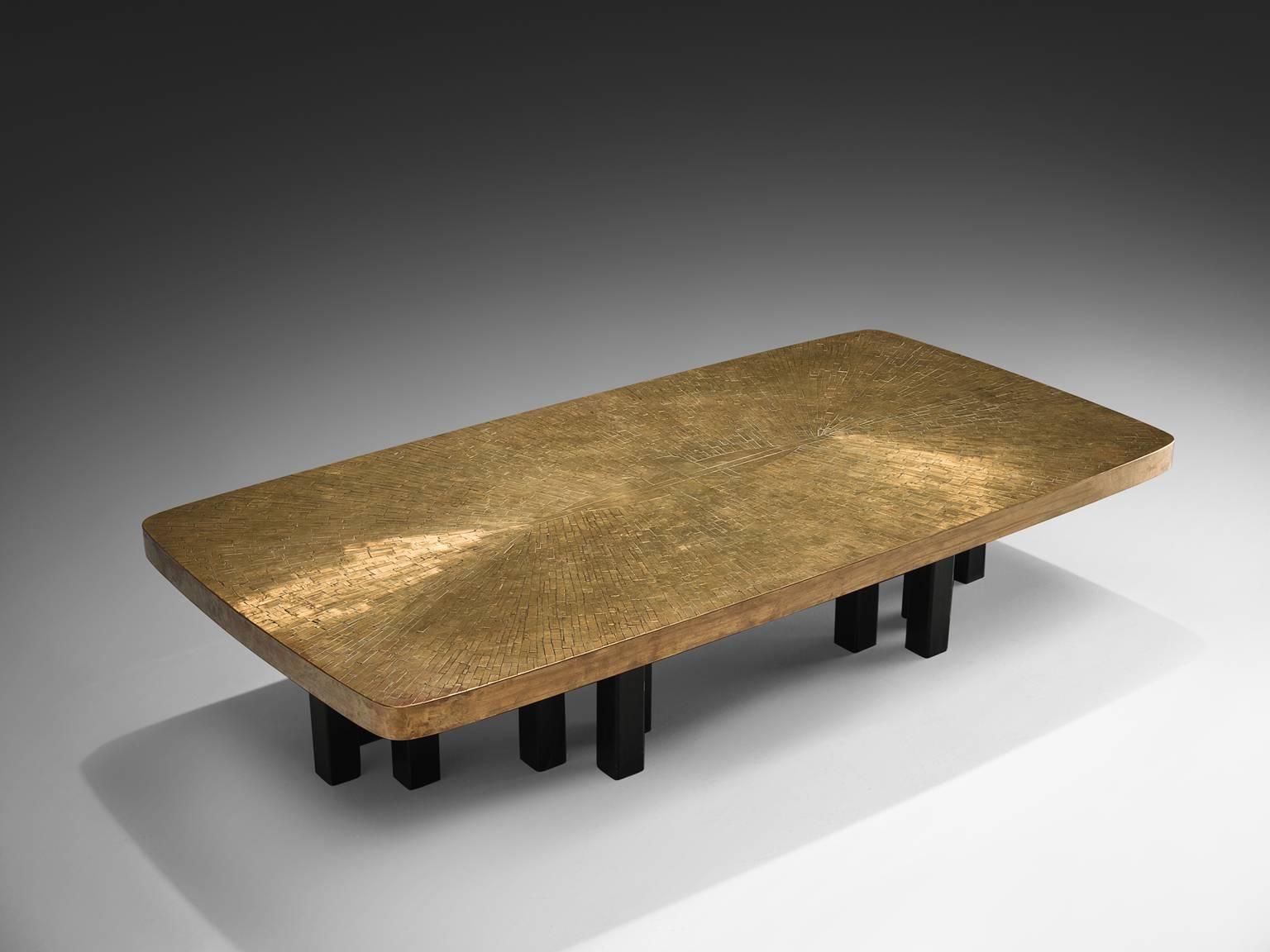 Jean Claude Dresse, brass and steel, Belgium, circa 1970.

This sculptural coffee table by Dresse was a private commission for a the interior of a Belgian diamond merchant from Antwerp. This example is of a spectacular size (measuring 180cm/6t)