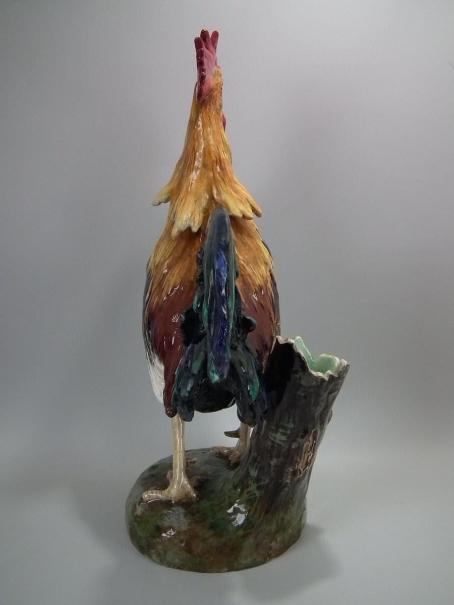 Jerome Massier French Majolica figural which features a large rooster, crowing. Colouration: ochre, puce, green, are predominant. The piece bears maker's marks for the Jerome Massier pottery.