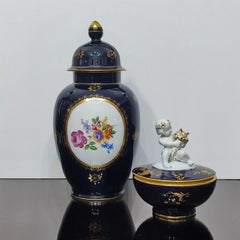 Large Jlmenau Porcelain Lidded Jar and a Hutschenreuter Sugar Bowl with Putto