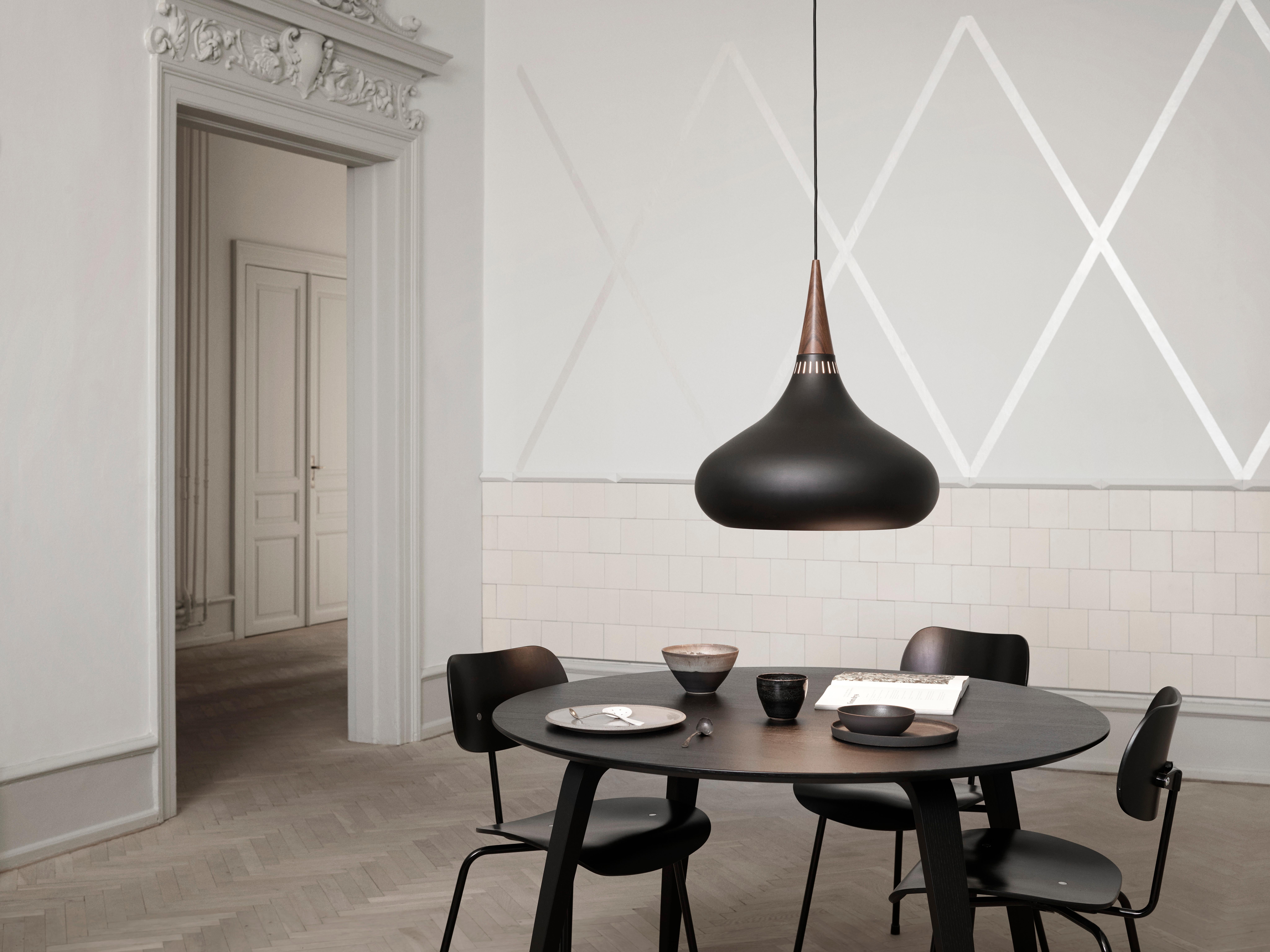 Large Jo Hammerborg 'Orient' Pendant Lamp for Fritz Hansen in Black and Rosewood.

Established in 1872, Fritz Hansen has become synonymous with legendary Danish design. Combining timeless craftsmanship with an emphasis on sustainability, the brand’s