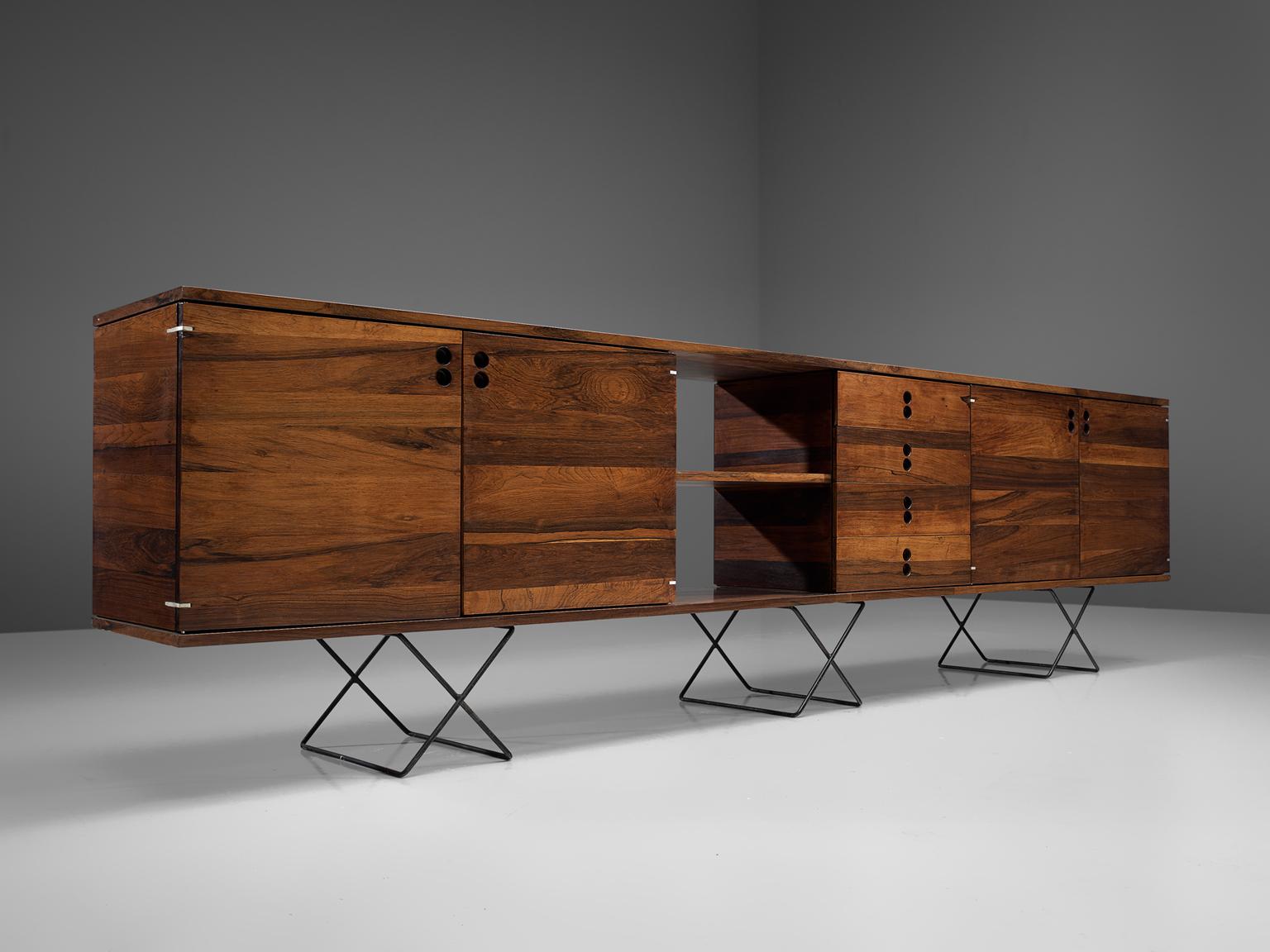Jorge Zalszupin for L'Atelier, sideboard, rosewood and metal, Brazil, 1960s

This nearly 3m/980ft long sideboard is part of Jorge Zalszupin's line of modular furniture. This line offers a variety of typologies and combination of modules to meet