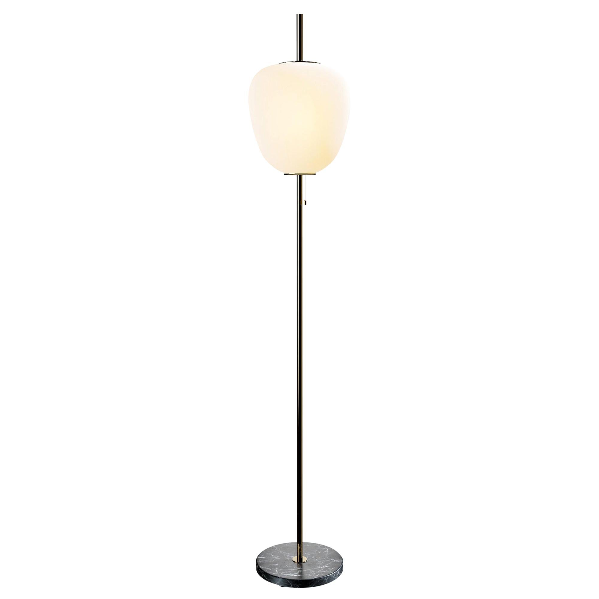 Large Joseph-André Motte J14 floor lamp in polished brass and black marble for Disderot. 

Originally designed in 1957, this sculptural floor lamp is a newly produced numbered edition with authentication certificate made in France by Disderot with