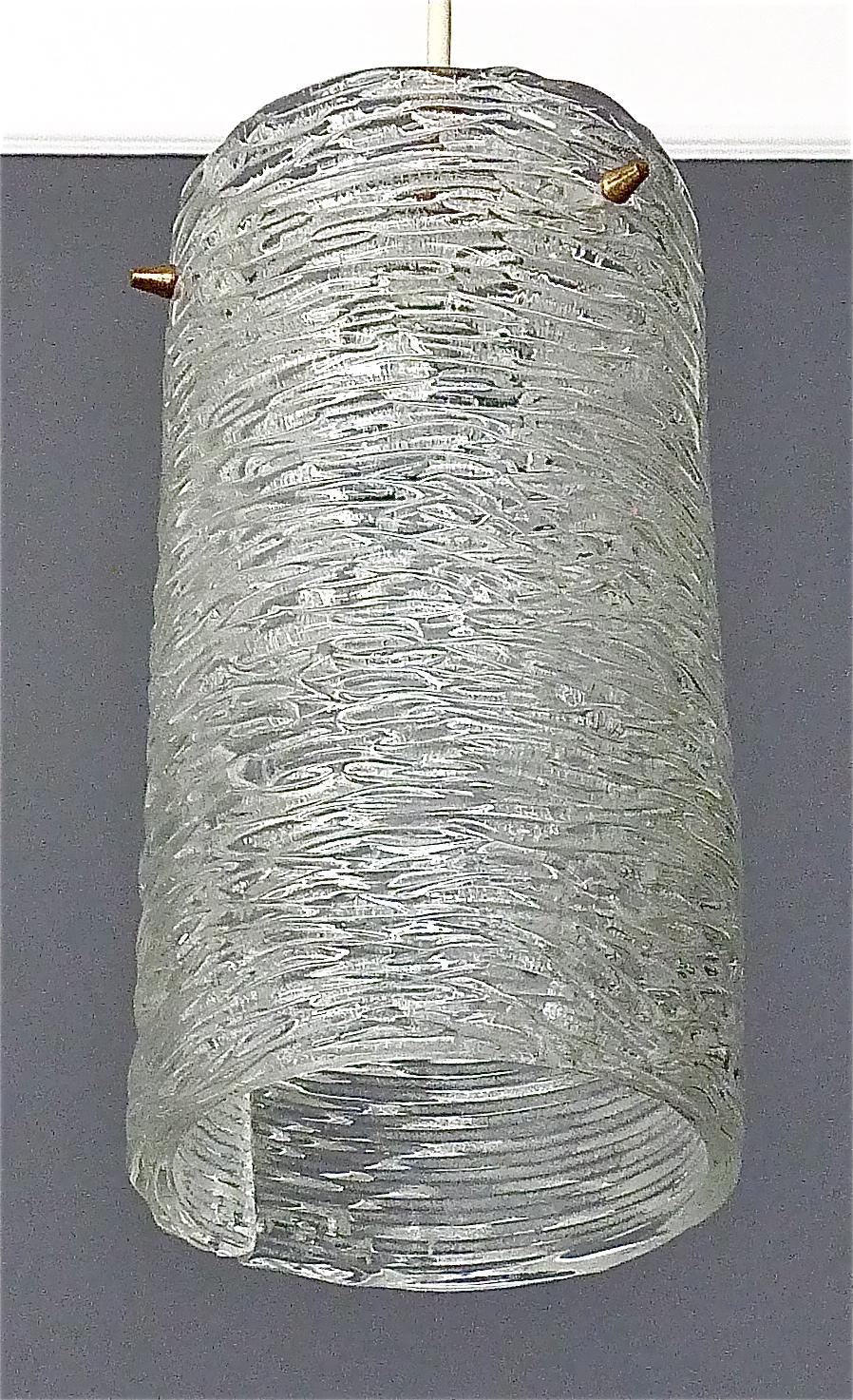 Fabulous of vintage midcentury J.T. Kalmar / Austria handcrafted tube pendant lamp, Vienna around 1950-1960. The large glass tube is made of clear glass and has a nice wavy texture. It has a white painted metal fitting with beautiful patinated brass