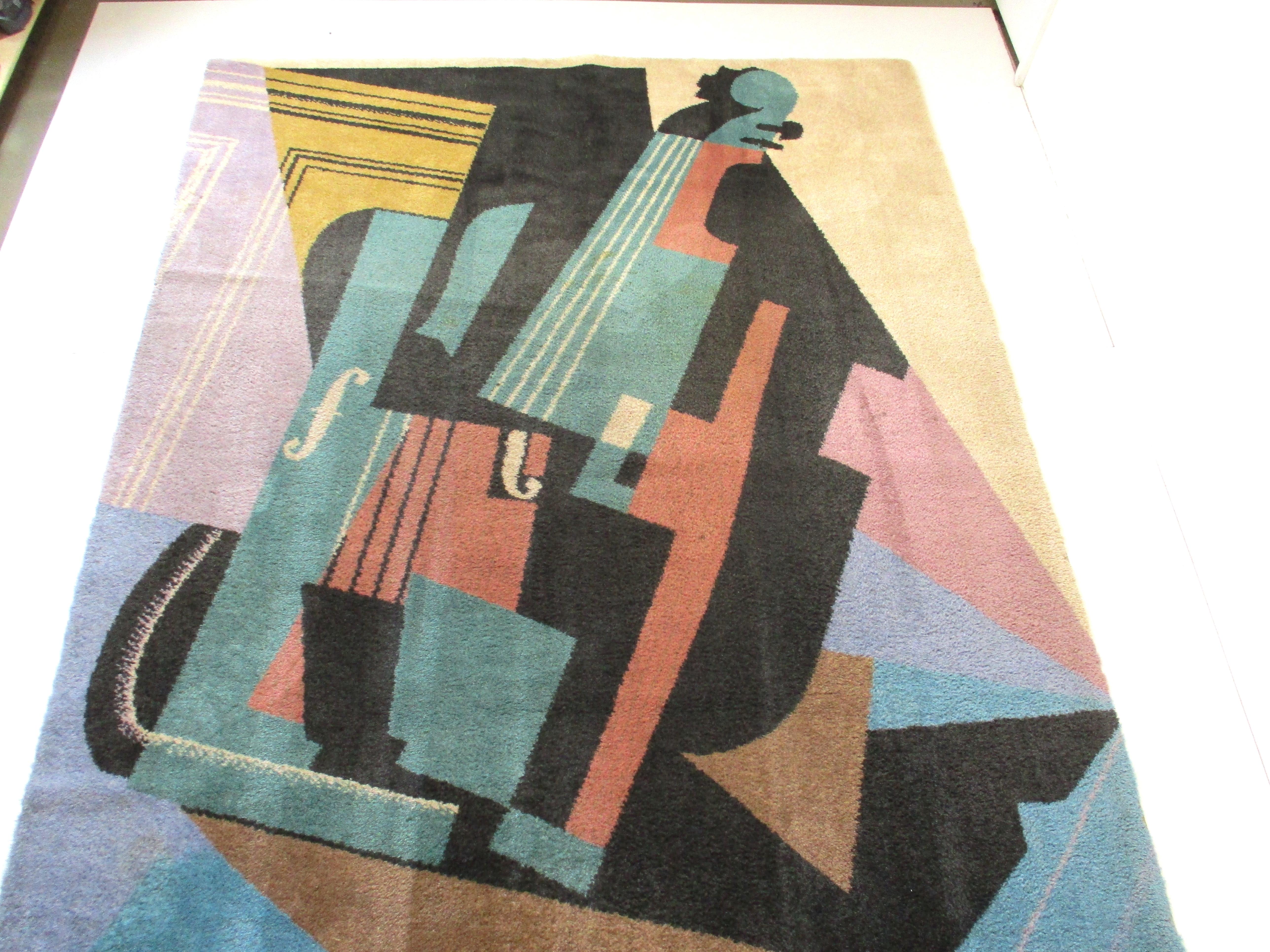 Très beau tapis en laine de style cubiste de l'artiste Juan Cris intitulé Violia tissé par Ege Arts Line A/S pour Ege Axminster. Issu de la Collection Worksal fabriquée au Danemark, ce tapis est bien conçu et de grande qualité.