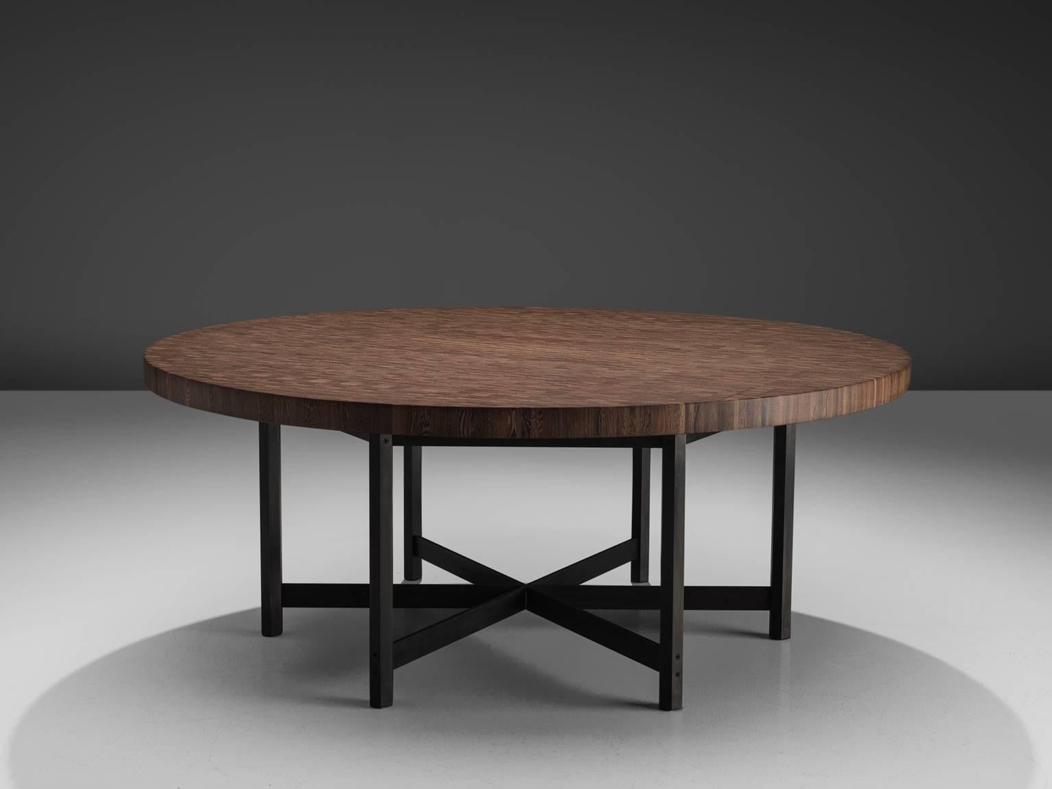 Jules Wabbes for Mobilier Universel, wenge and metal with canon de fusil metal, Belgium, 1960s. 

This large wenge table is one of Jules Wabbes personal favorites. The top is executed with wenge end-grain wood top. End-grain cut is particularly