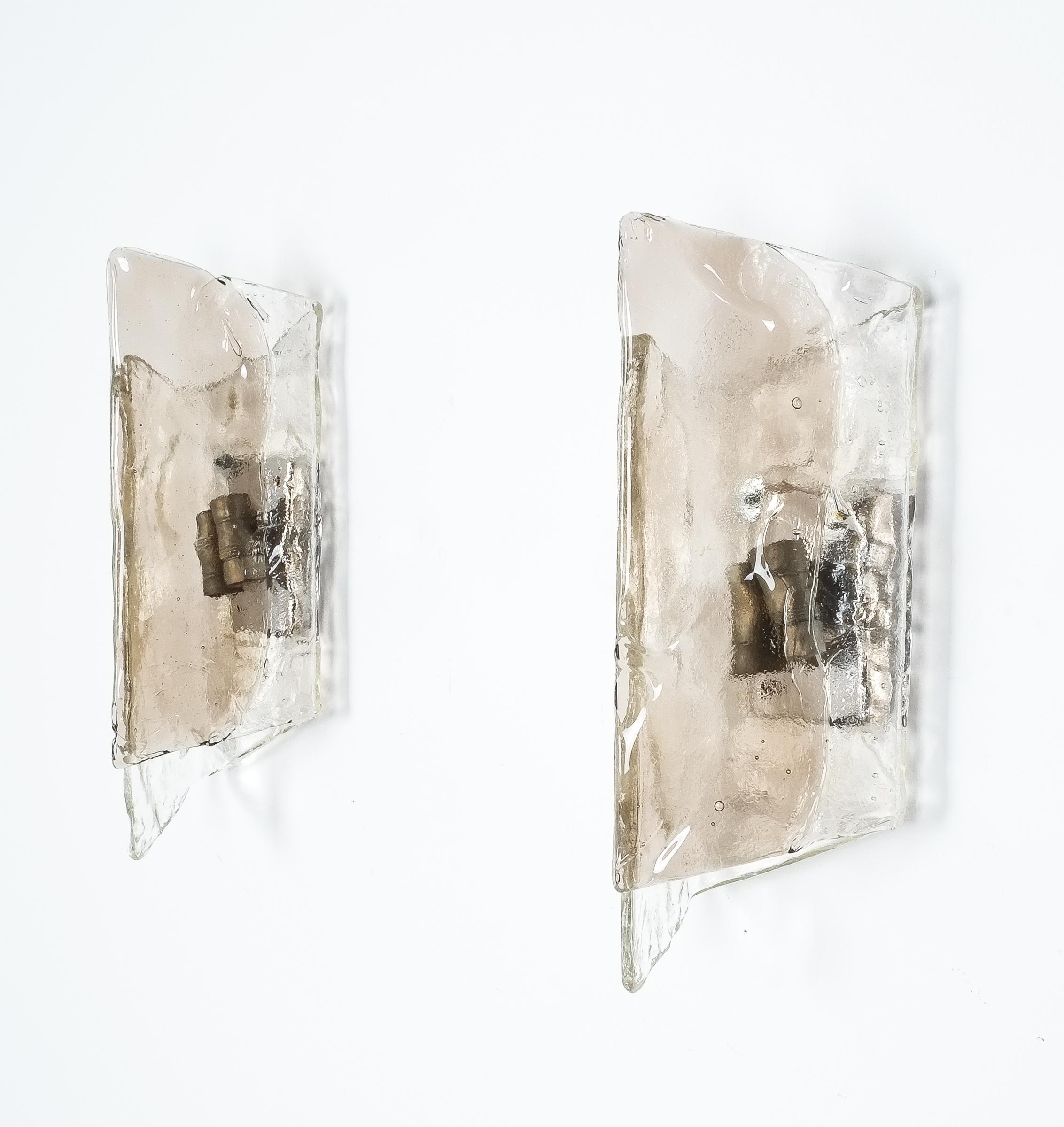 Pair of large J.T. Kalmar smoked thick clear glass sconces, 1970, Austria. Formidable 15.7