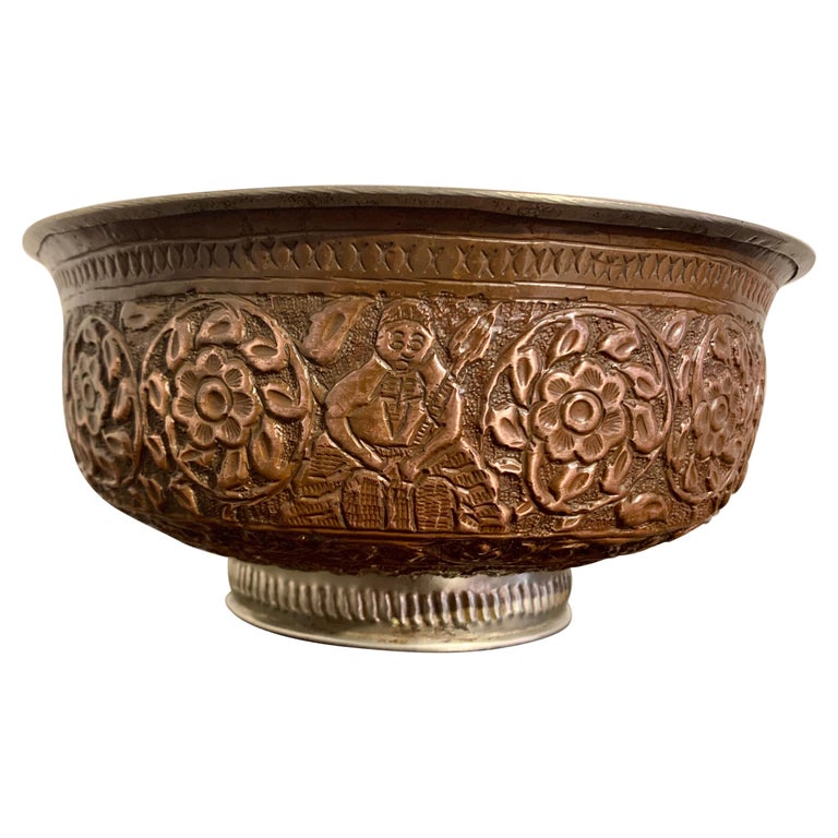 https://a.1stdibscdn.com/large-kashmiri-copper-repousse-footed-bowl-early-20th-century-for-sale/1121189/f_240889421623395996353/24088942_master.jpg?width=768
