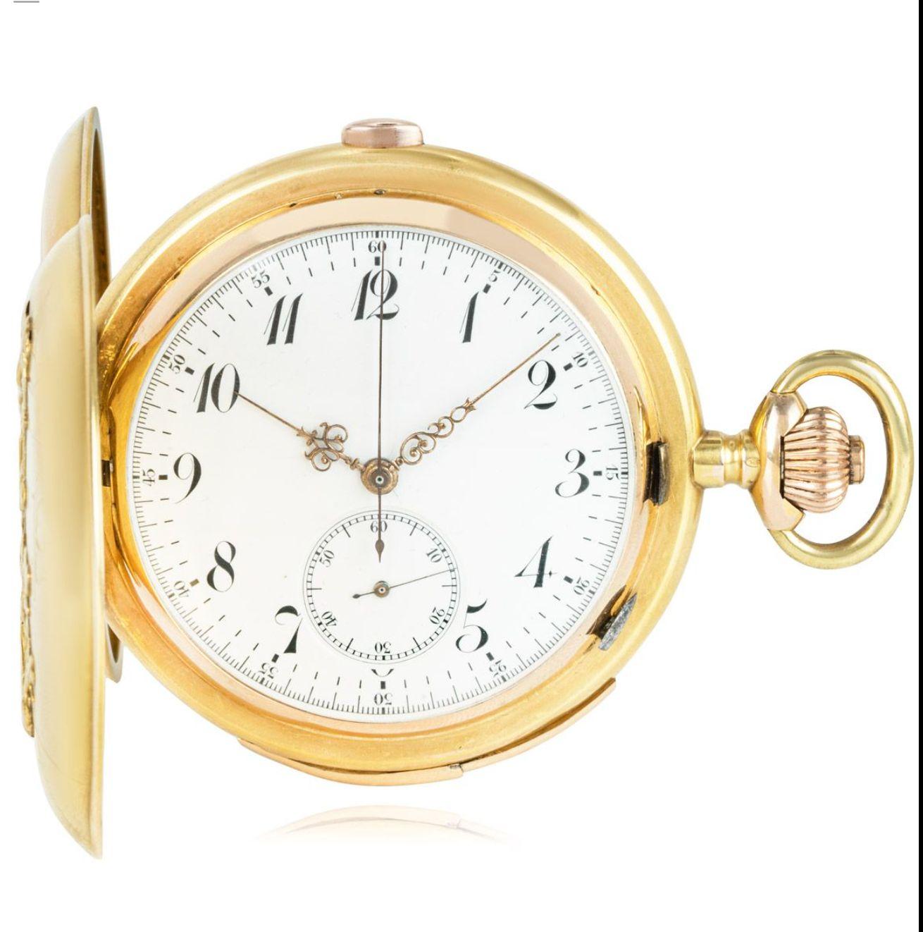 A large 18ct gold Keyless Lever Minute Repeater Chronograph Full Hunter Pocket Watch C1890 .

Dial: the excellent white enamel dial with Arabic numerals and outer minute track with five second intervals, subsidiary seconds dial at six o'clock with
