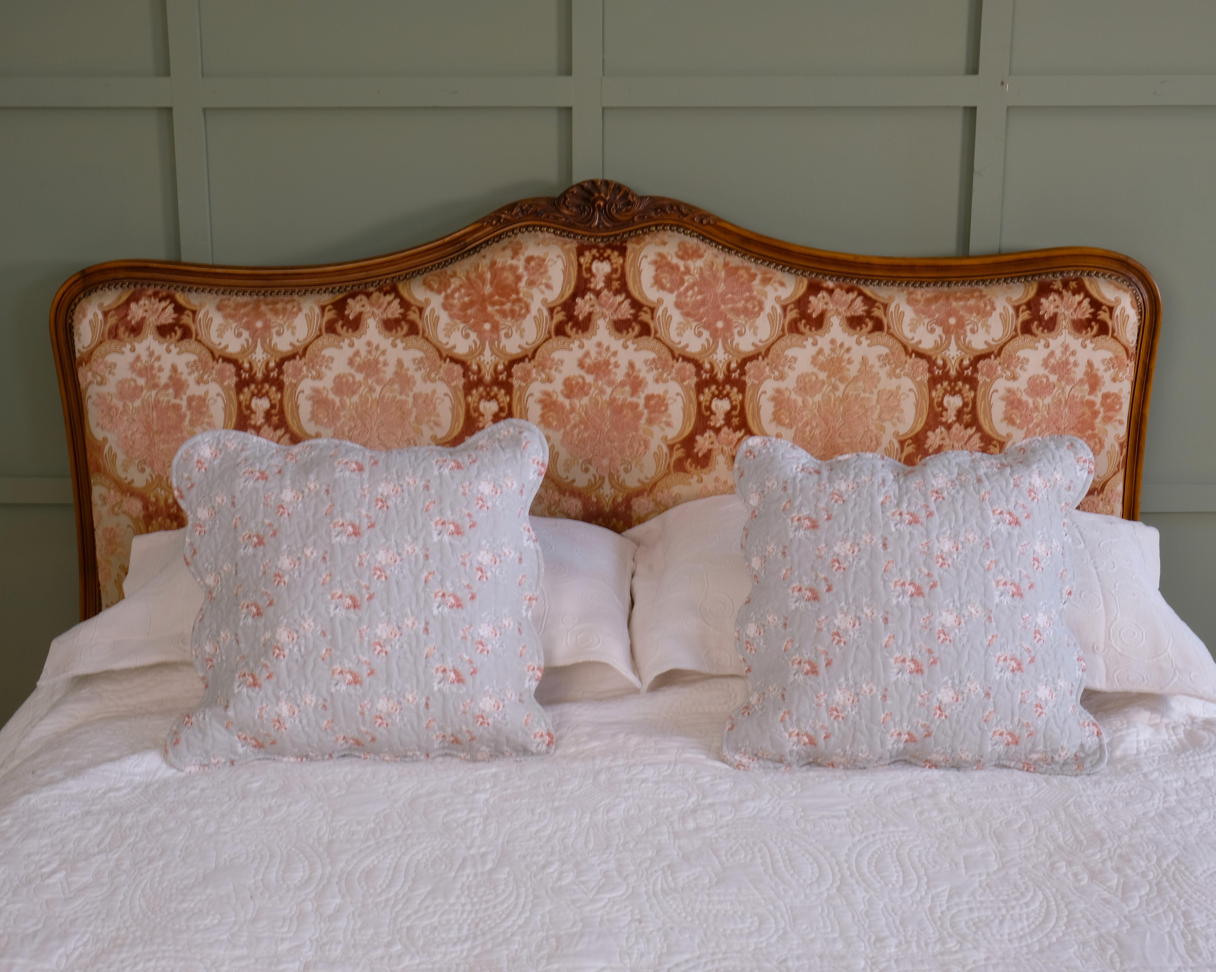 Small super king or large king size bedframe. A very smart looking bed with the original wooden frame and stunning flock velvet fabric. This is the original fabric and it is in excellent condition. The colours are a peachy, pink, coral with a creamy
