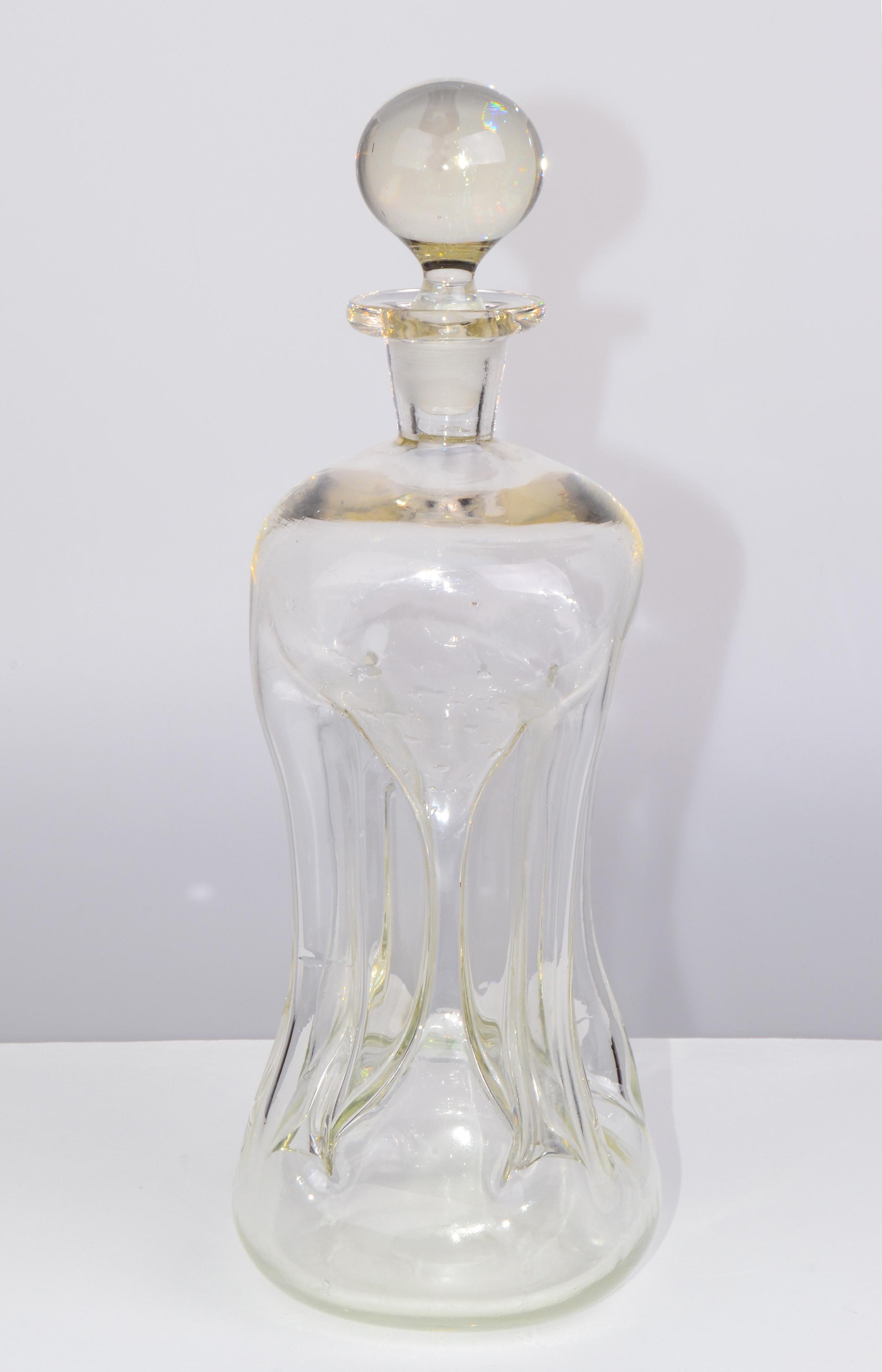 Large Hand-blown glass decanter Kluk Kluk, designed by Jacob E. Bang and made in Denmark circa 1960s. 
Danish architect-designed mouth-blown decanters were made for the glass manufacturer Holmegaard-Kastrup. 
No markings, no labels. A Danish Modern