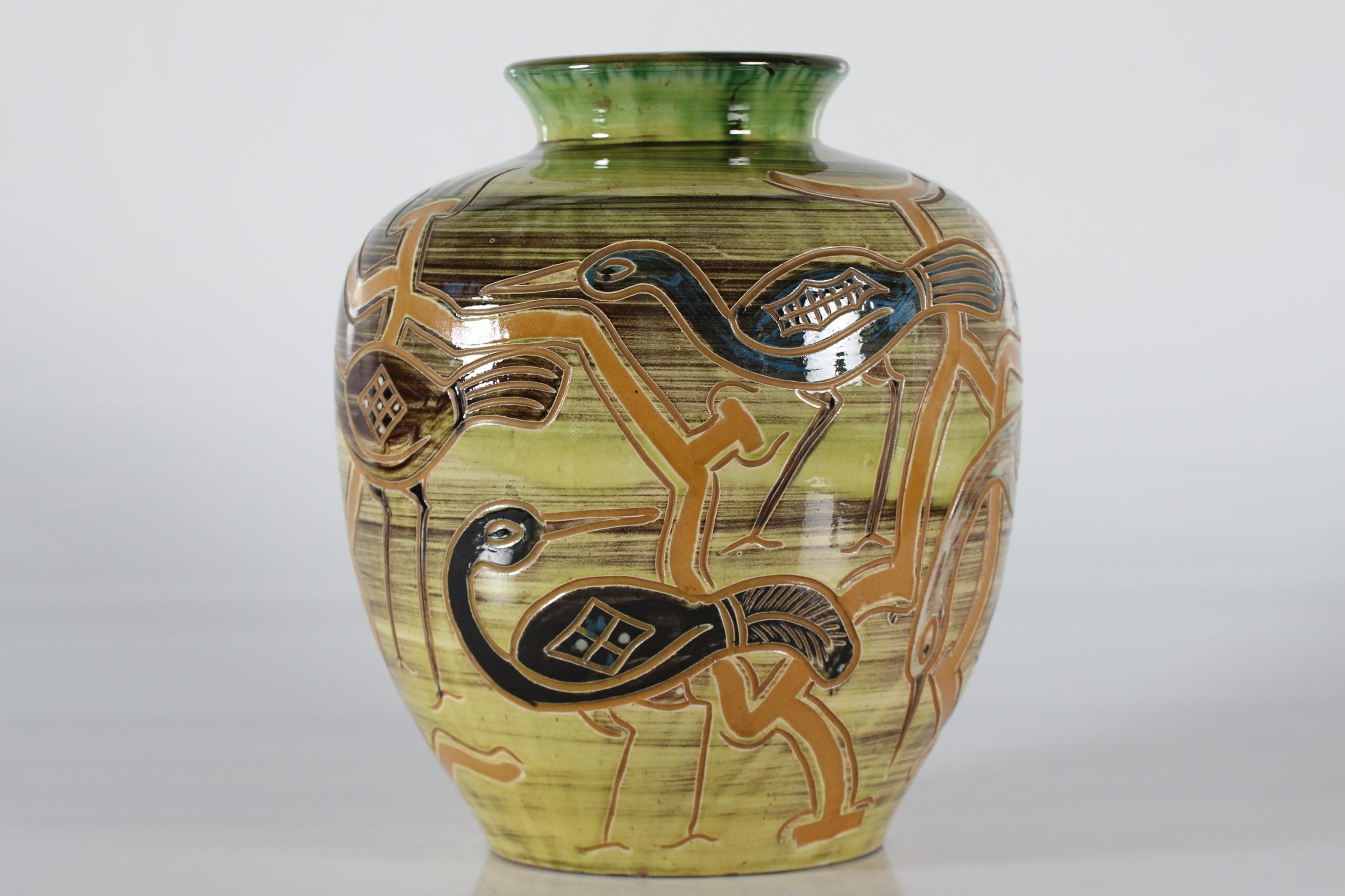 Huge and remarkable Danish ceramic floor vase designed by Harald Folmer Gross (1888-1961) made by Knabstrup Ceramics. 
H. F. Gross worked for Knabstrup in the period 1941 to 1945.

The multi colored vase has different kinds of spectacular birds