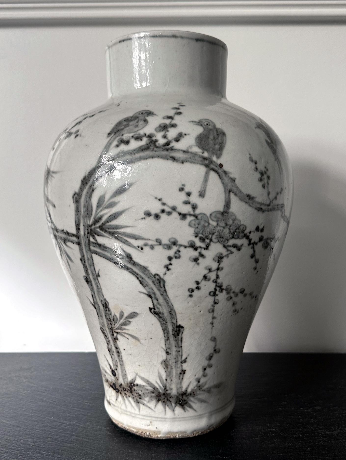 A large Korean white porcelain jar with underglaze decoration circa late 19th century of Joseon Dynasty. The vase has a well-proportioned profile of a classic jar (known as Hangari in Korean and was being produced since 18th century from Punwon-ri