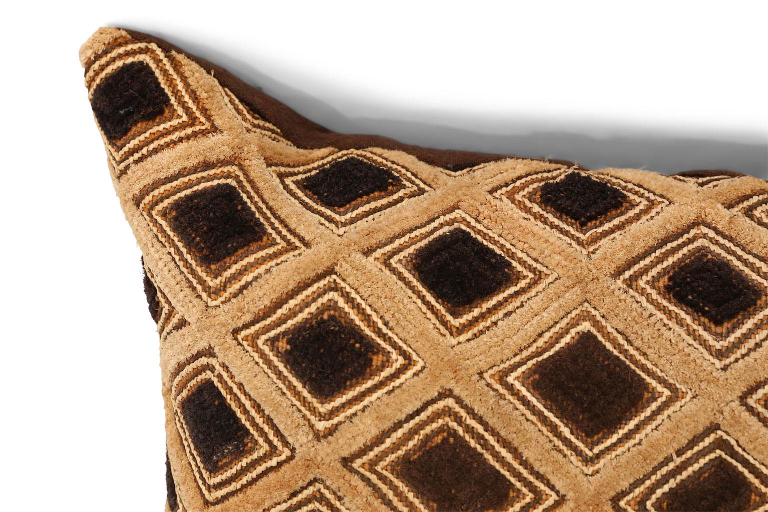 Large Kuba cloth cushion: face is made from vintage Kuba cloth (raphia palm with cut pile to resemble velvet). Backed by hand-dyed vintage hemp. Includes zip fastener and feather insert. Compliments a second Kuba cloth cushion in our inventory (item