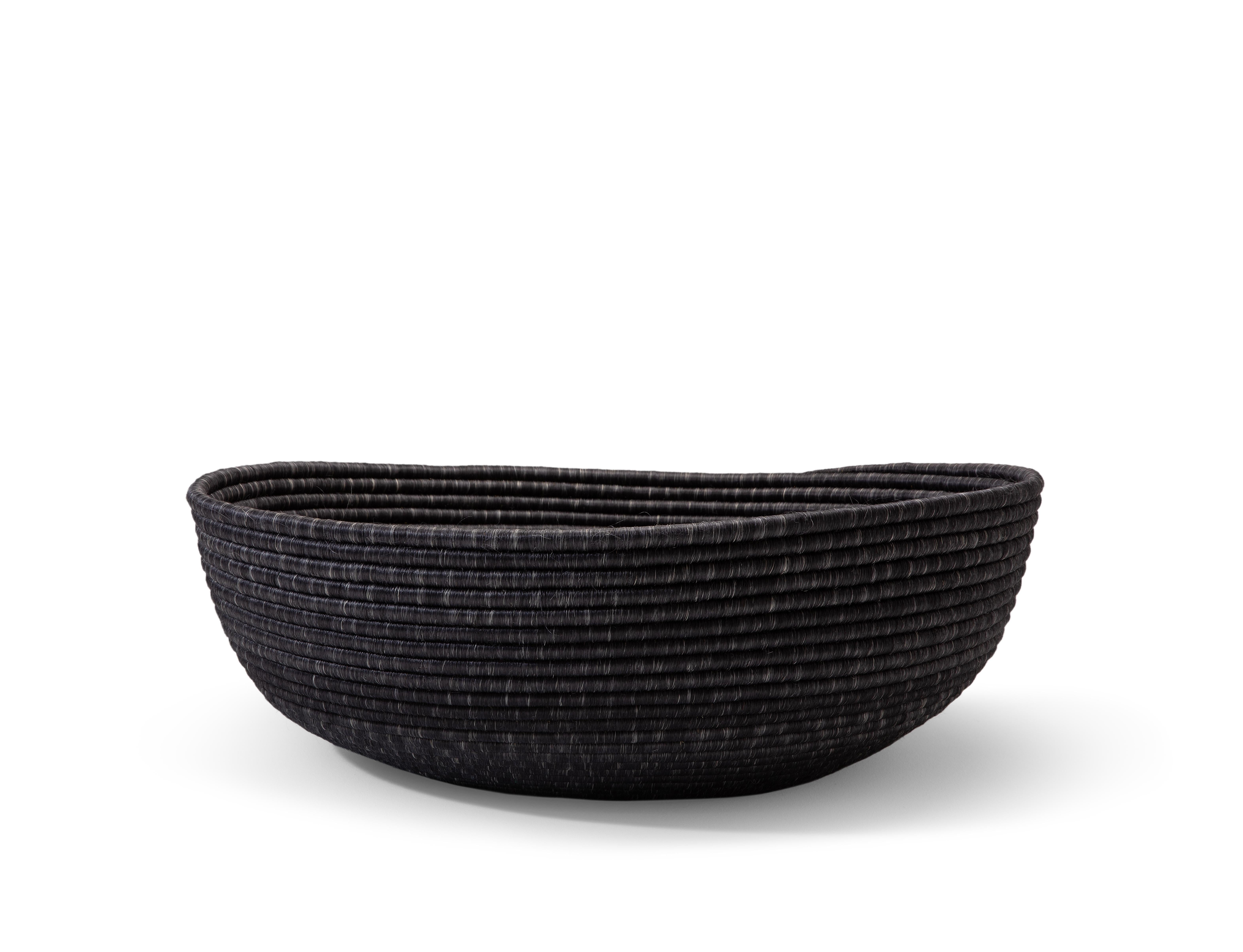 Large la che basket by Sebastian Herkner
Materials: 100 % natural fique agave.
Technique: Hand-woven in Colombia. 
Dimensions: Diameter 78 cm x H 30 cm 
Available in colors: cobre, olive, black, cuerda. And other sizes.
The La Che Basket is