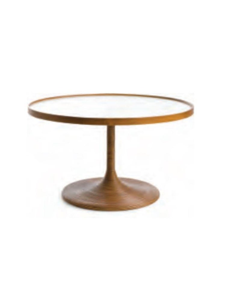 Large La Luna table by Kenneth Cobonpue
Materials: Rattan, high-pressure laminate, maple. 
Also available in other colors. 
Dimensions: Diameter 80 cm x height 46 cm

La Luna’s quiet sophistication is defined by a soft, round shape that feels
