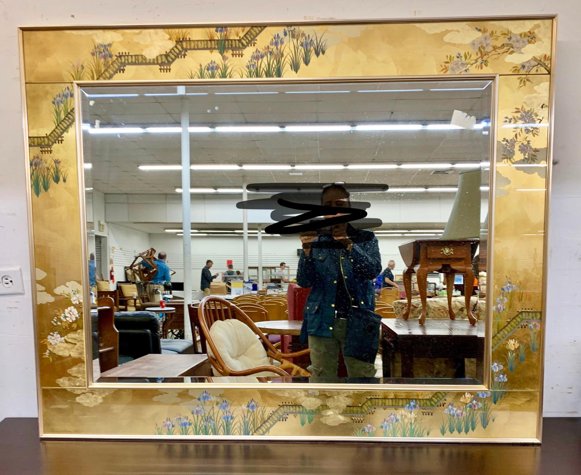LaBarge Chinoiserie style reverse painted gold leaf mirror with beautiful floral motif. Features beveled glass and signature on bottom left, M. A. DePree.