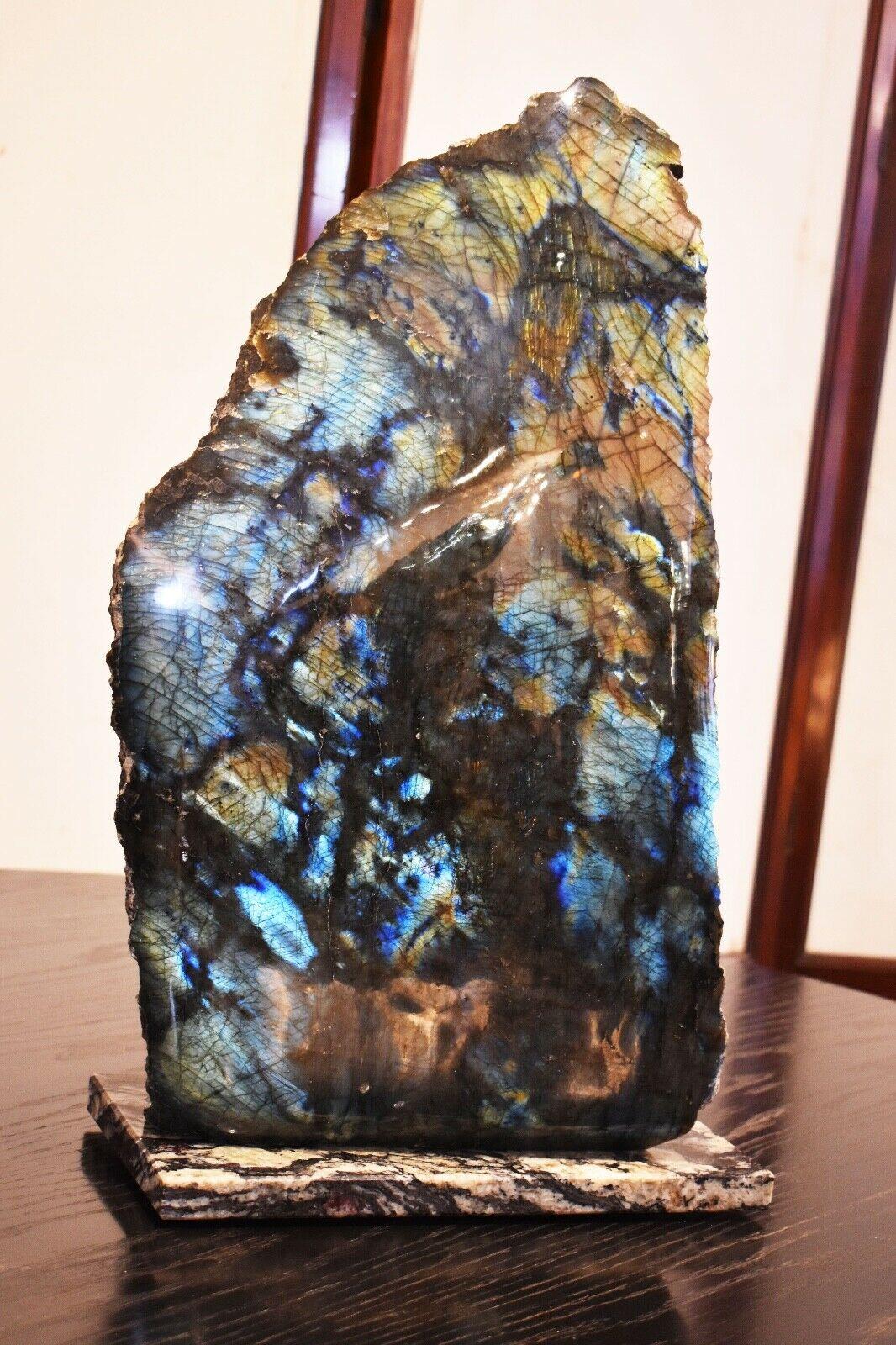A superb large natural Labradorite Iridescent crystal, approx 28kg. 

Beautiful and rare in this size, it makes a stunning statement piece.