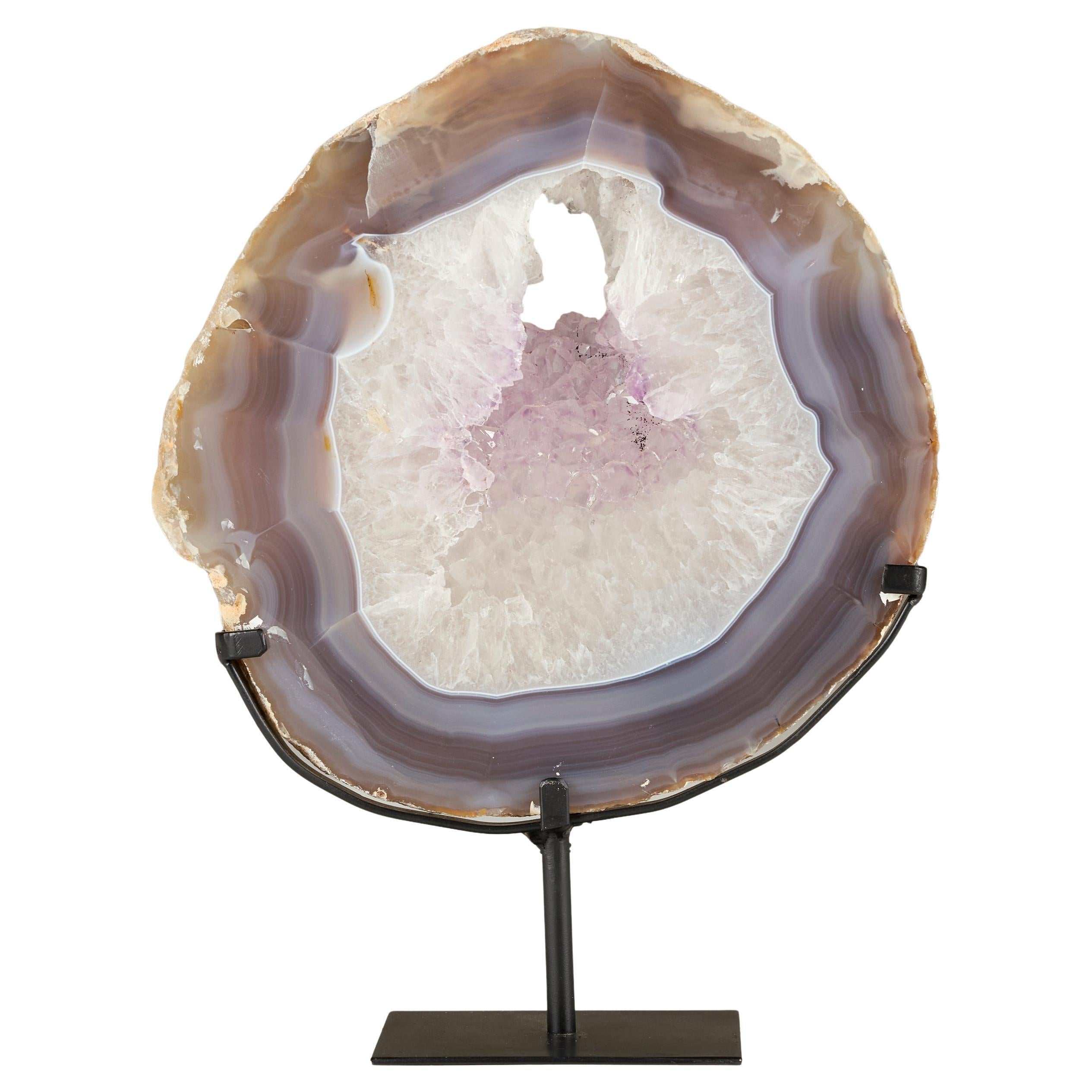 Large lace agate slice with quartz and amethyst centre