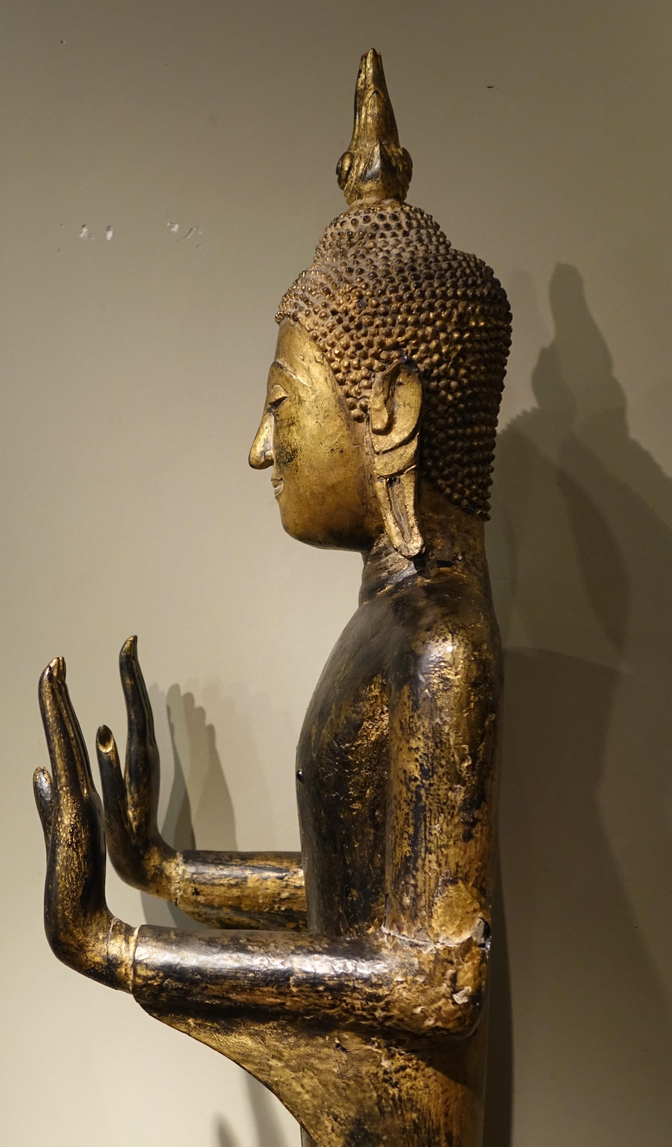 Gilt Large lacquered and gilt wood Buddha, Siam, 18th Century