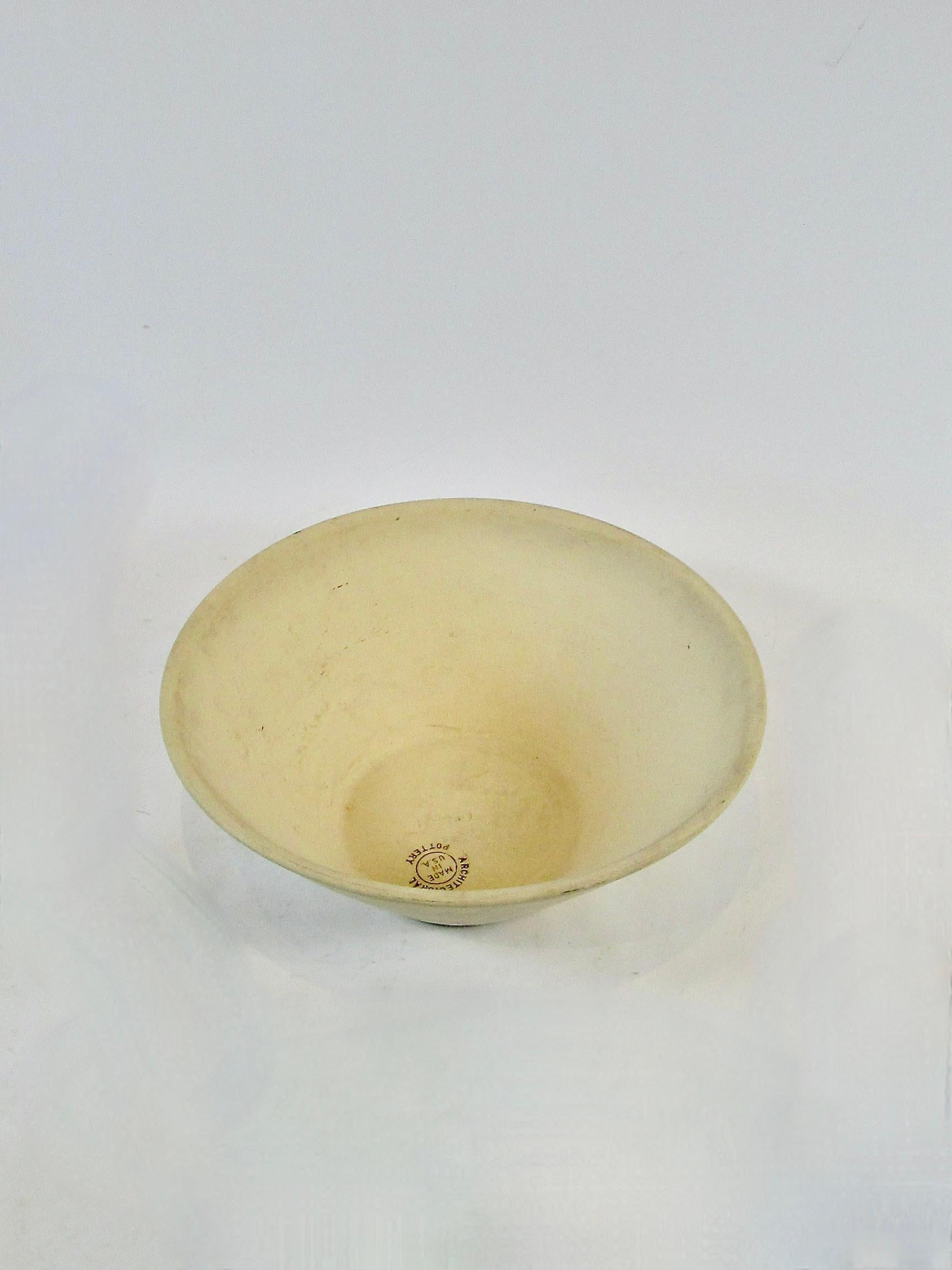 To me Architectural Pottery  is California modern . Fun large planter pots by a crew of multi talented designers . Produced from the early 1950s to mid 1960s . This wide cone shaped pot designed by Lagardo Tackett appears to have never been used .