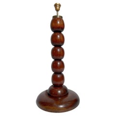 Large lamp base in turned wood attributed to Charles Dudouyt, France circa 1940